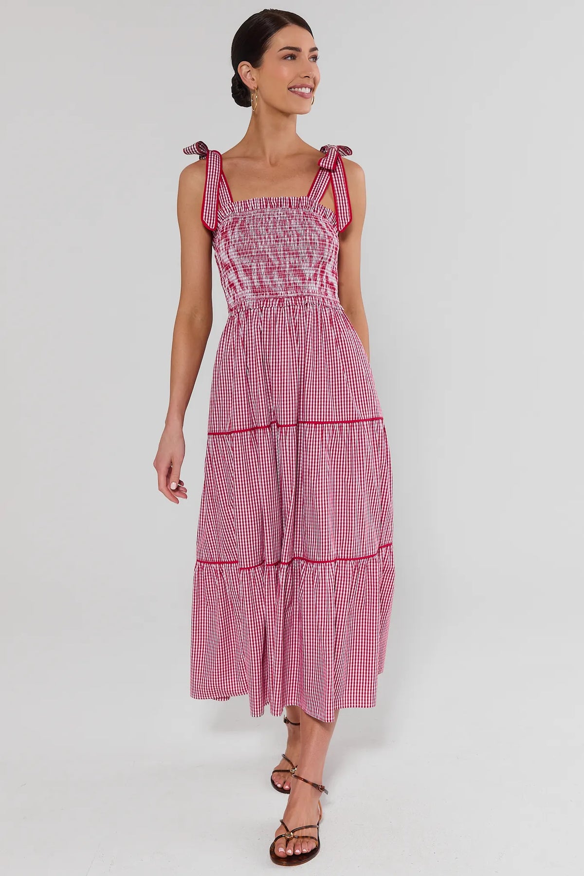 Grace Red Gingham Smocked Maxi Dress - Front View, full-length red gingham tiered modest maxi dress for women | Avara