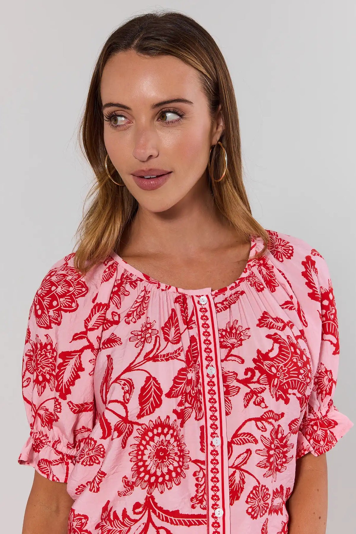 Pink Floral Button Up Top close-up showing button placket and scoop neckline detail | Avara