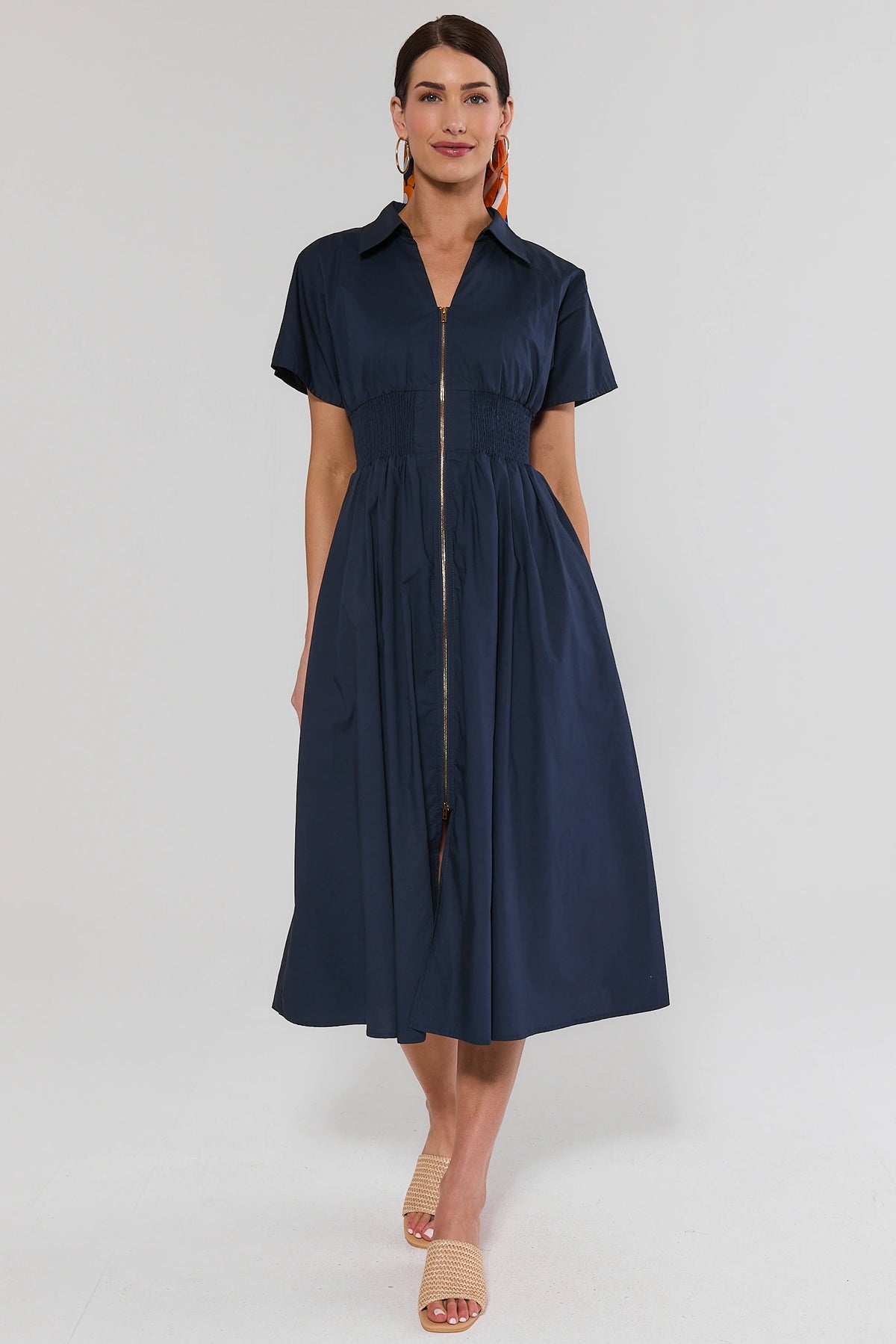 Navy Zip Up Midi Dress with smocked waist and gold zipper - Front View | Avara