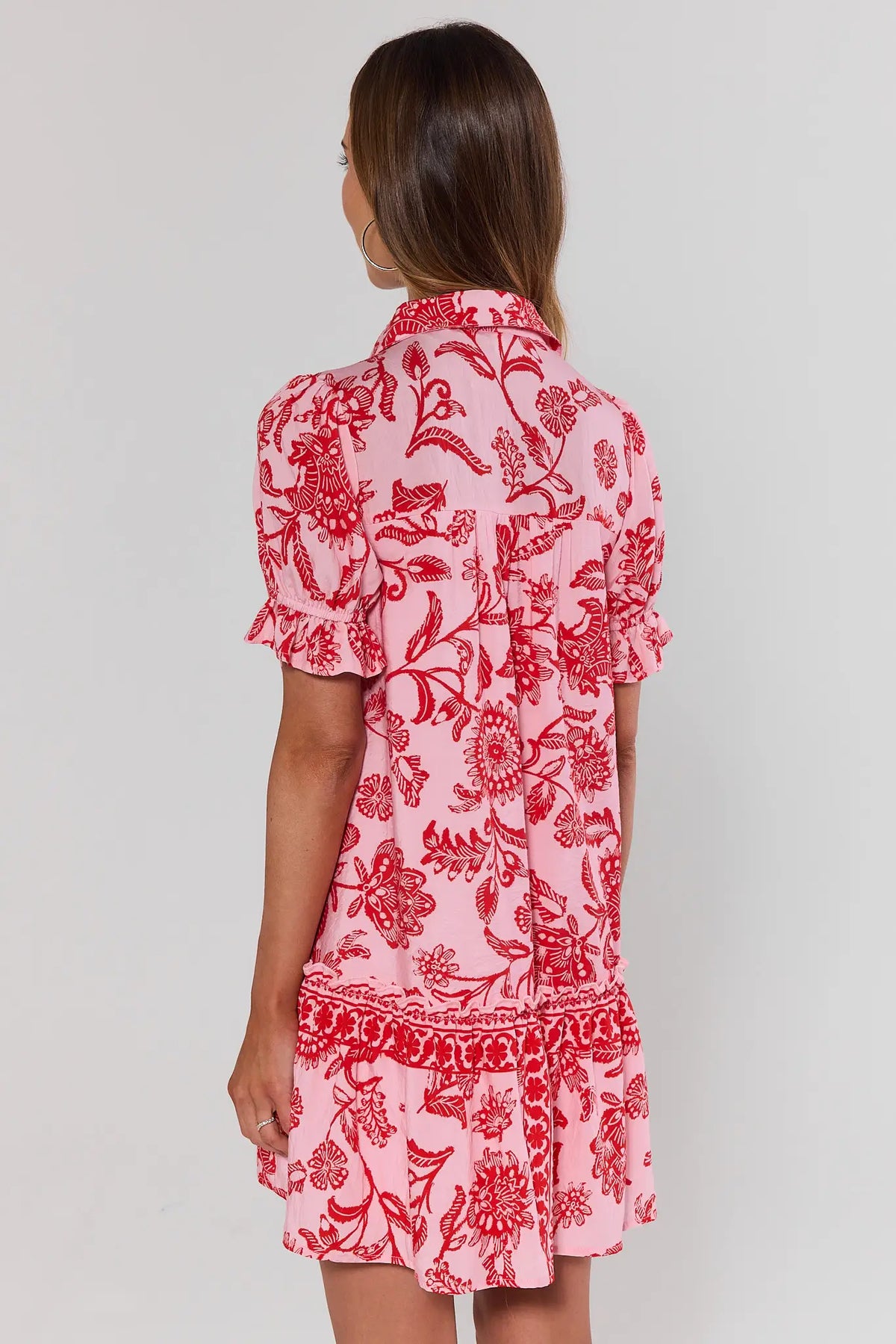 Sophia Pink Floral Button Up Short Dress with tiered ruffle hem and collar detail - Back View on Model | Avara