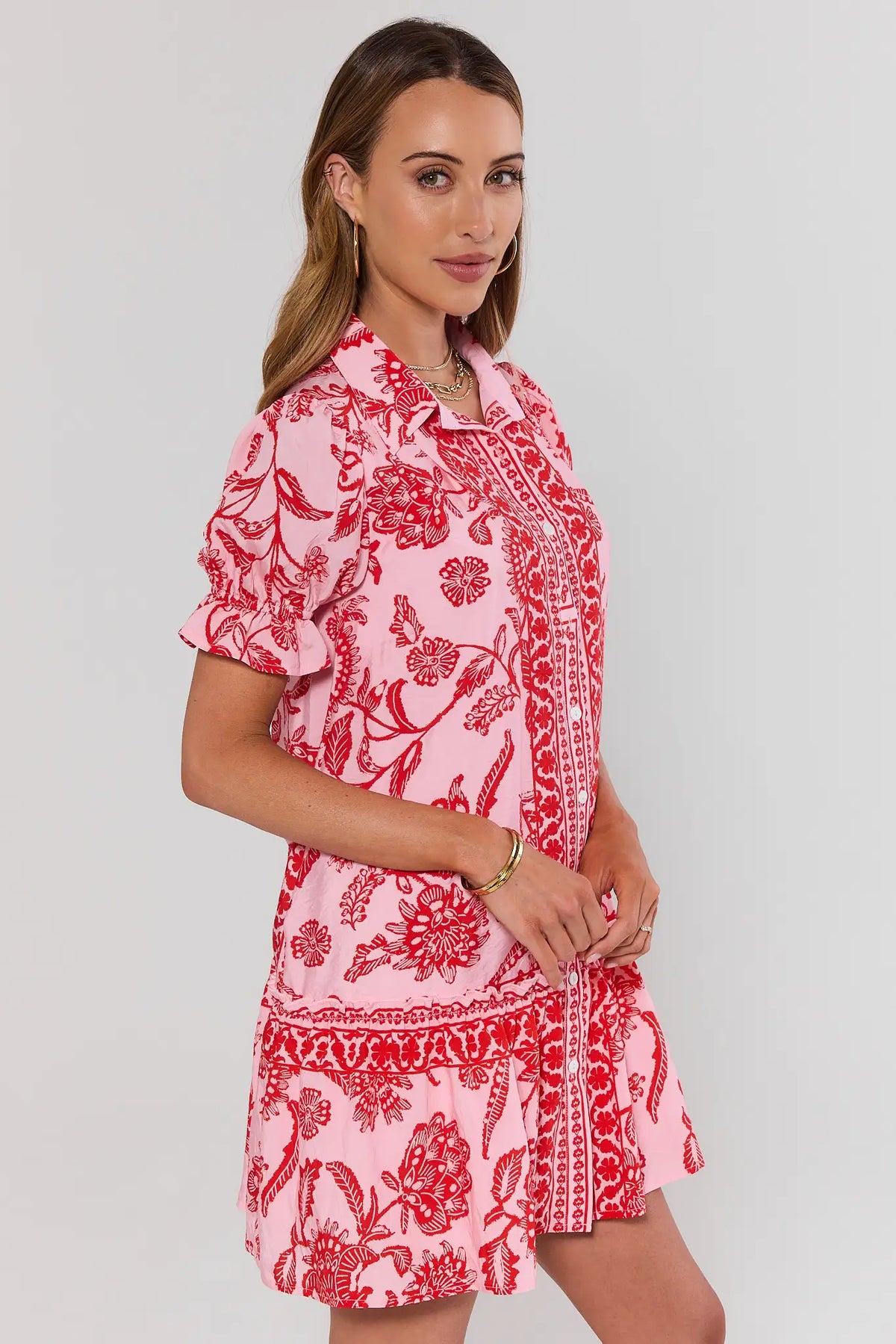 Sophia Pink Floral Button Up Short Dress showing puff sleeve and tiered ruffle hem - Side Profile View | Avara