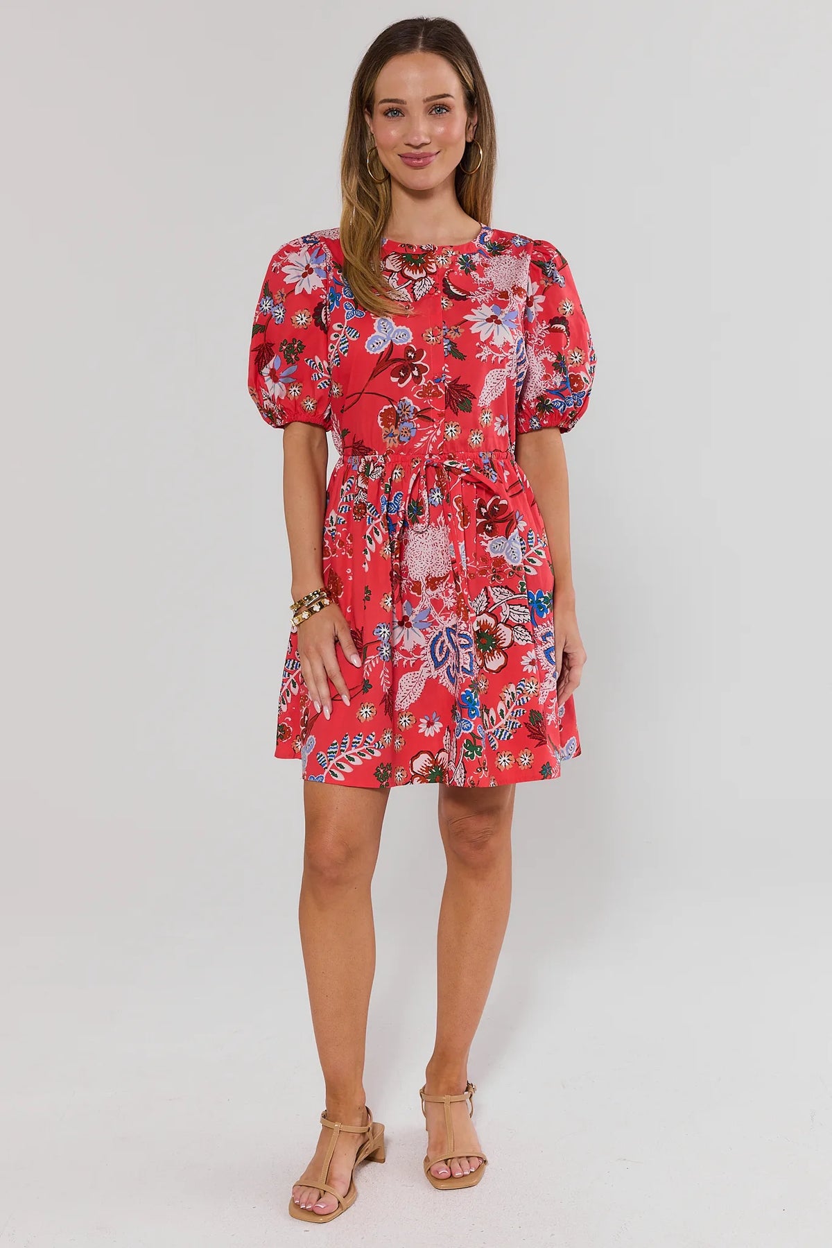 Coral multi-floral short dress with puff sleeves styled with block sandals - Full Front View | Avara