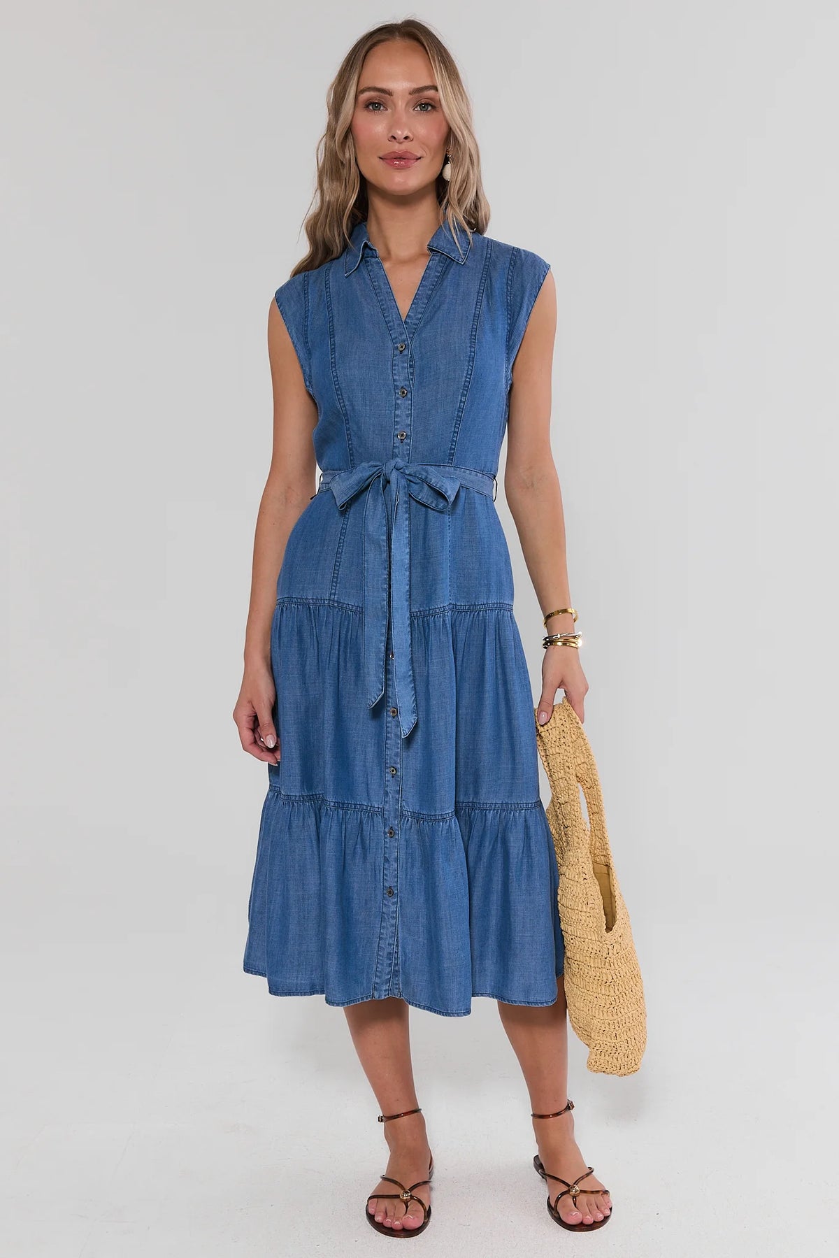 Nadine Chambray Midi Dress in blue - front view, tiered skirt with tie waist | Avara