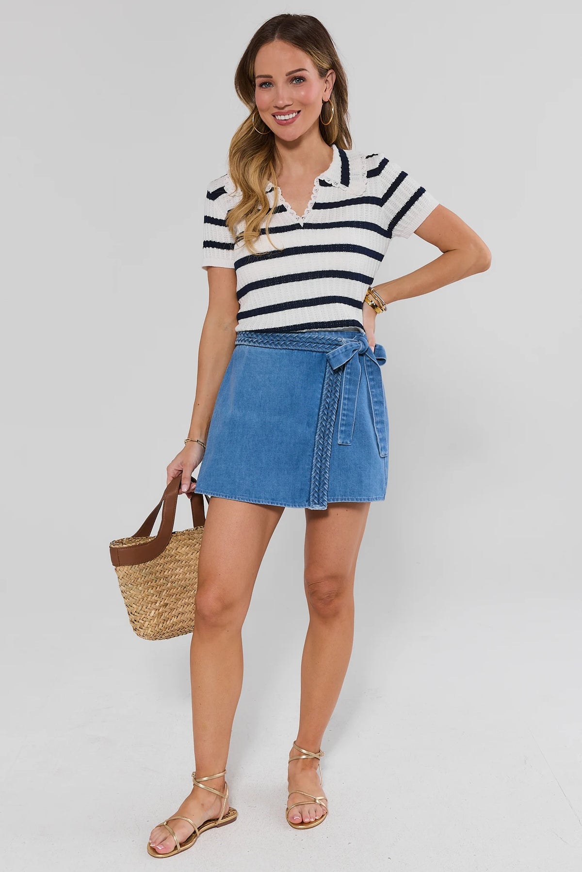 Women's denim wrap skort styled with navy striped top and straw tote - Full Styled Look | Avara