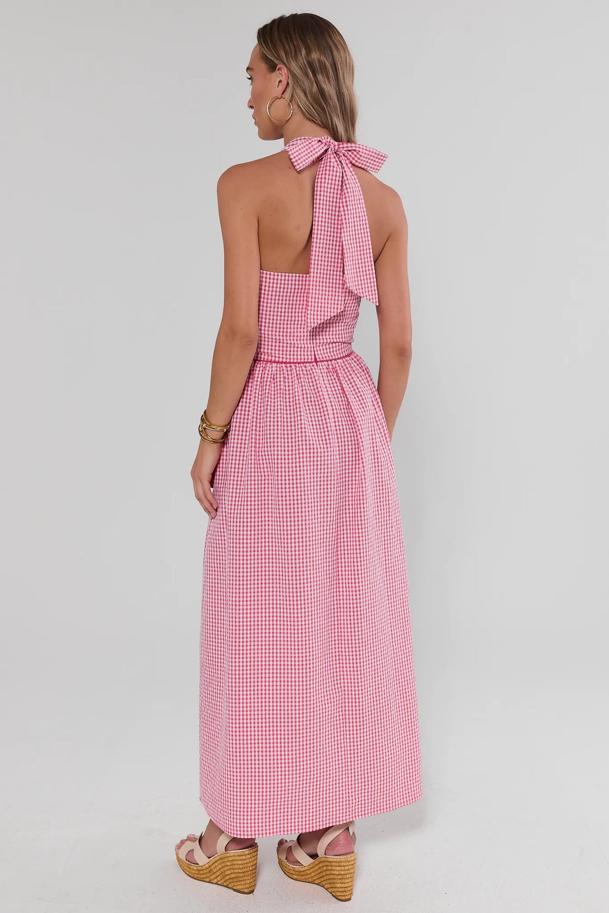 Red and white gingham maxi dress open back with halter tie bow detail - back view | Avara