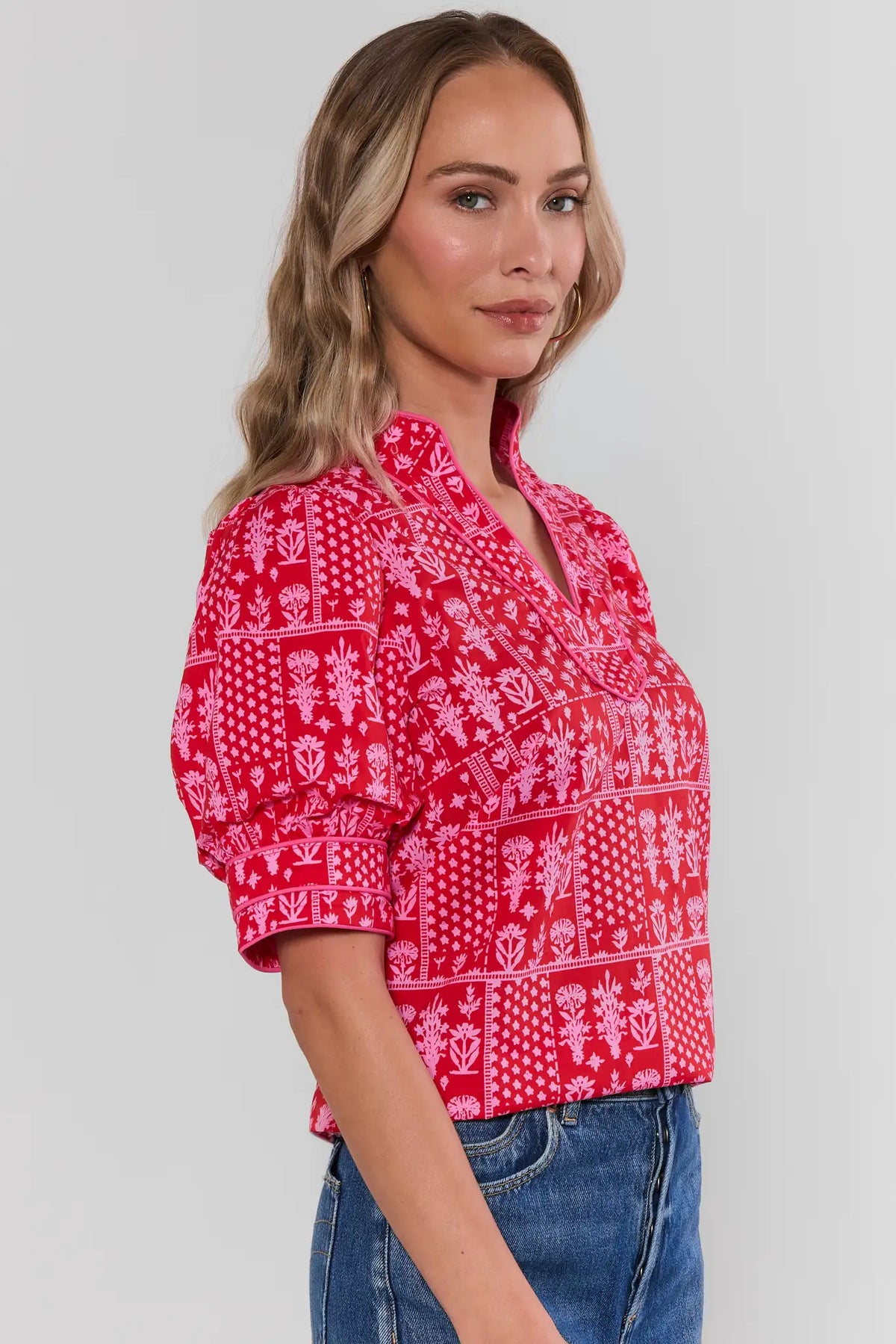 Dakota Red Floral Printed Puff Sleeve Top paired with blue jeans - Side View | Avara