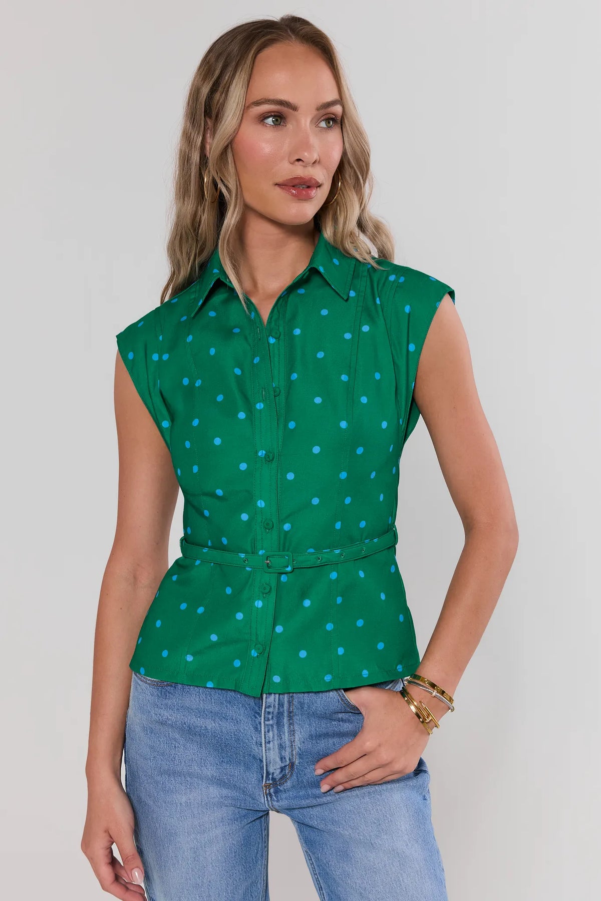 Green polka dot belted top with blue dots, collared button-down, sleeveless - Front View | Avara