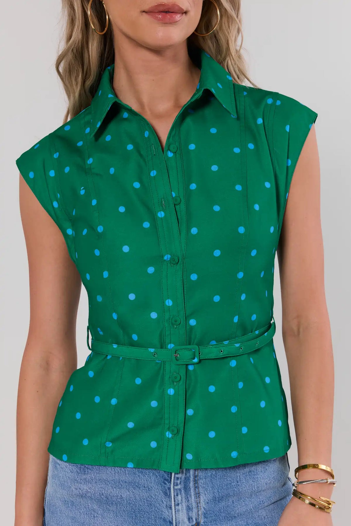 Green polka dot top with belt detail and point collar - Close-Up Front Detail | Avara