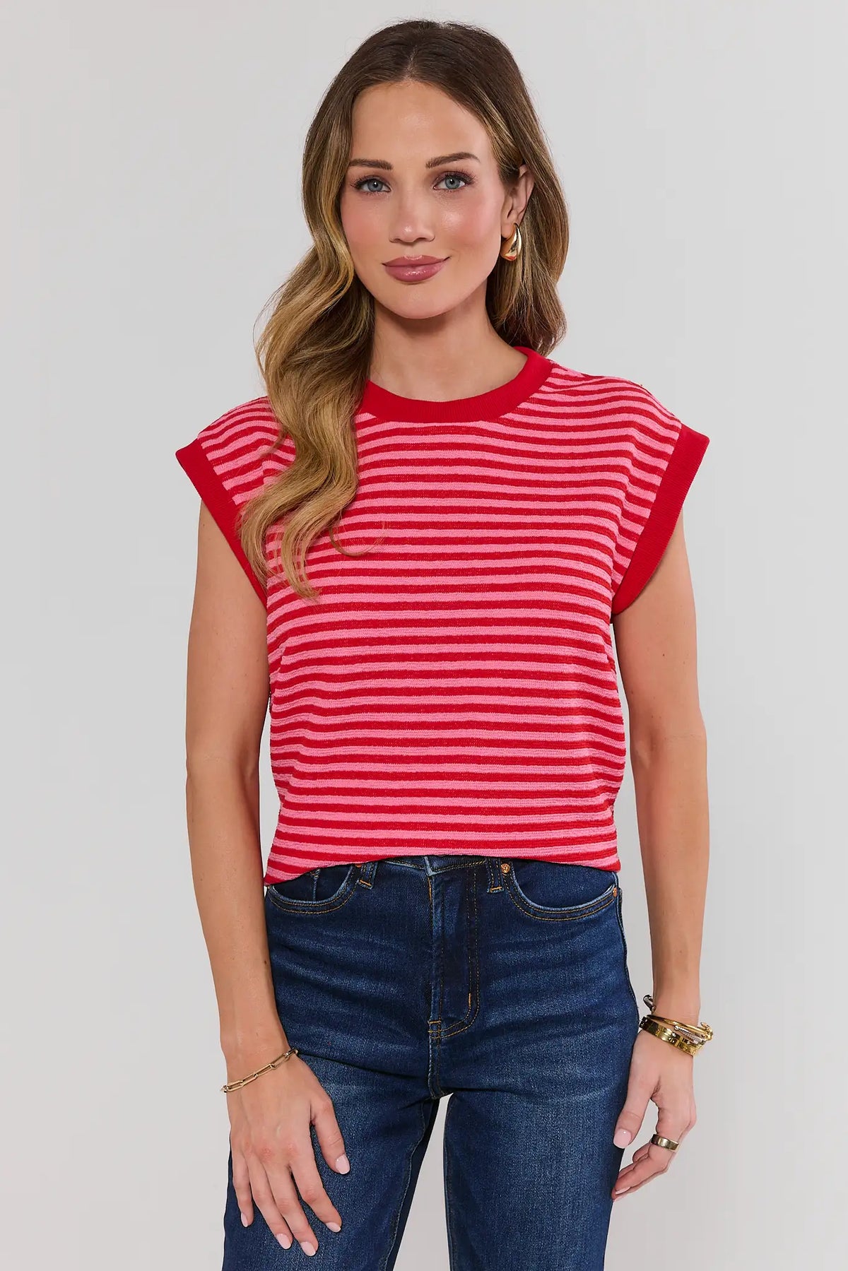 Pink & Red Striped Terry Cloth Top styled with dark wash jeans - Front View | Avara