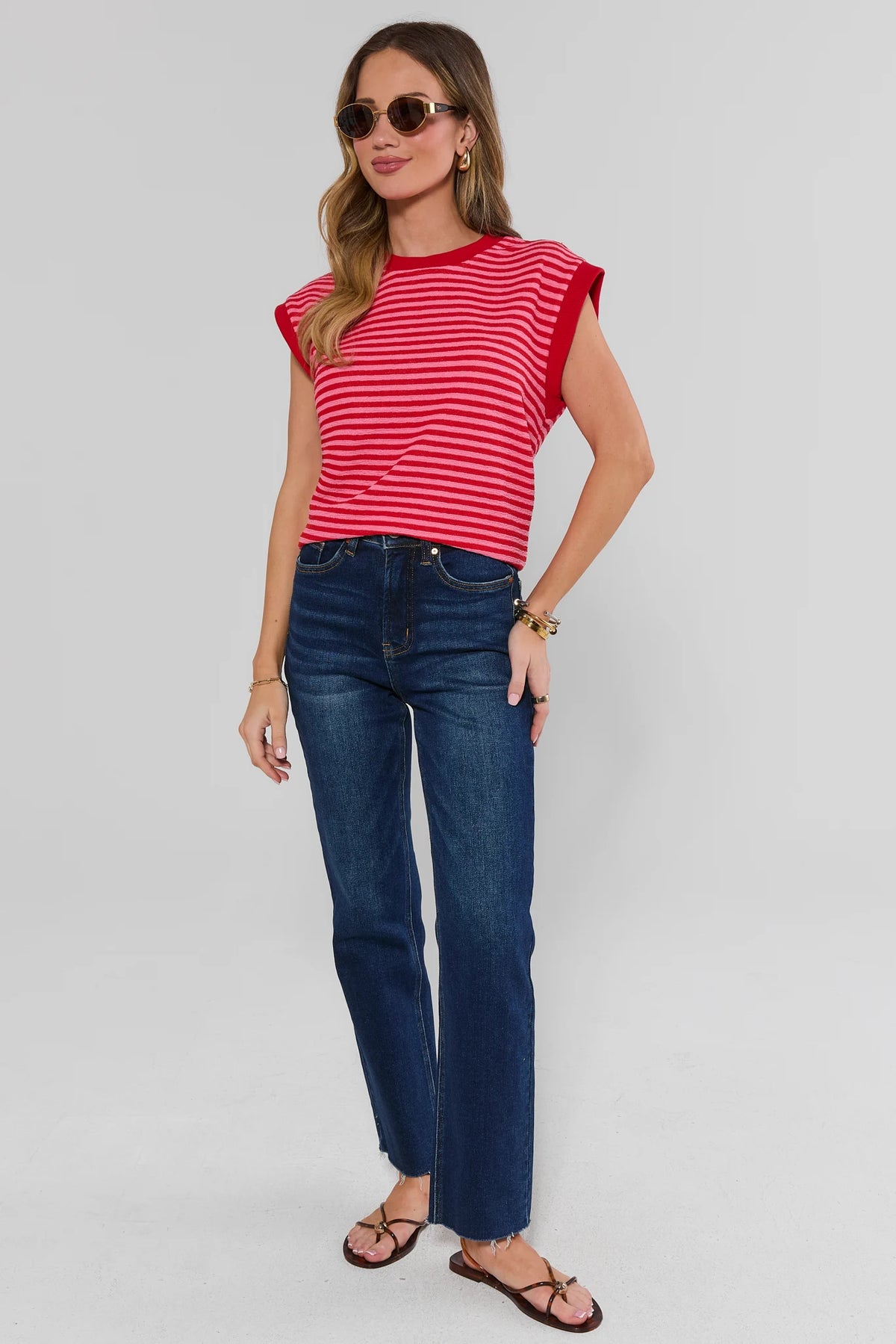 Pink & Red Striped Terry Cloth Cap Sleeve Top paired with denim - Full Length Side View | Avara