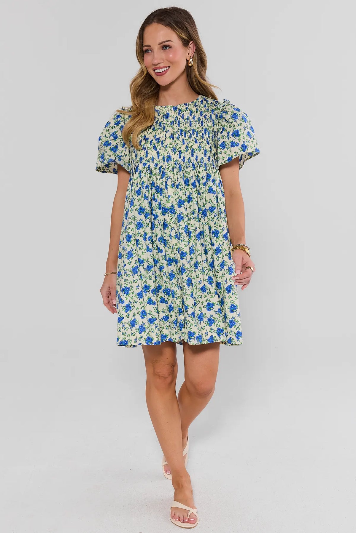 Blue Floral Pleated Short Dress full-length front view on model with white sandals | Avara