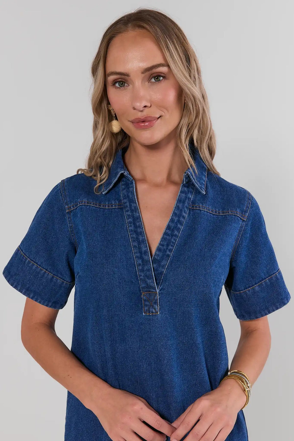Medium Wash Denim Short Dress, contrast stitching collar detail close-up | Avara