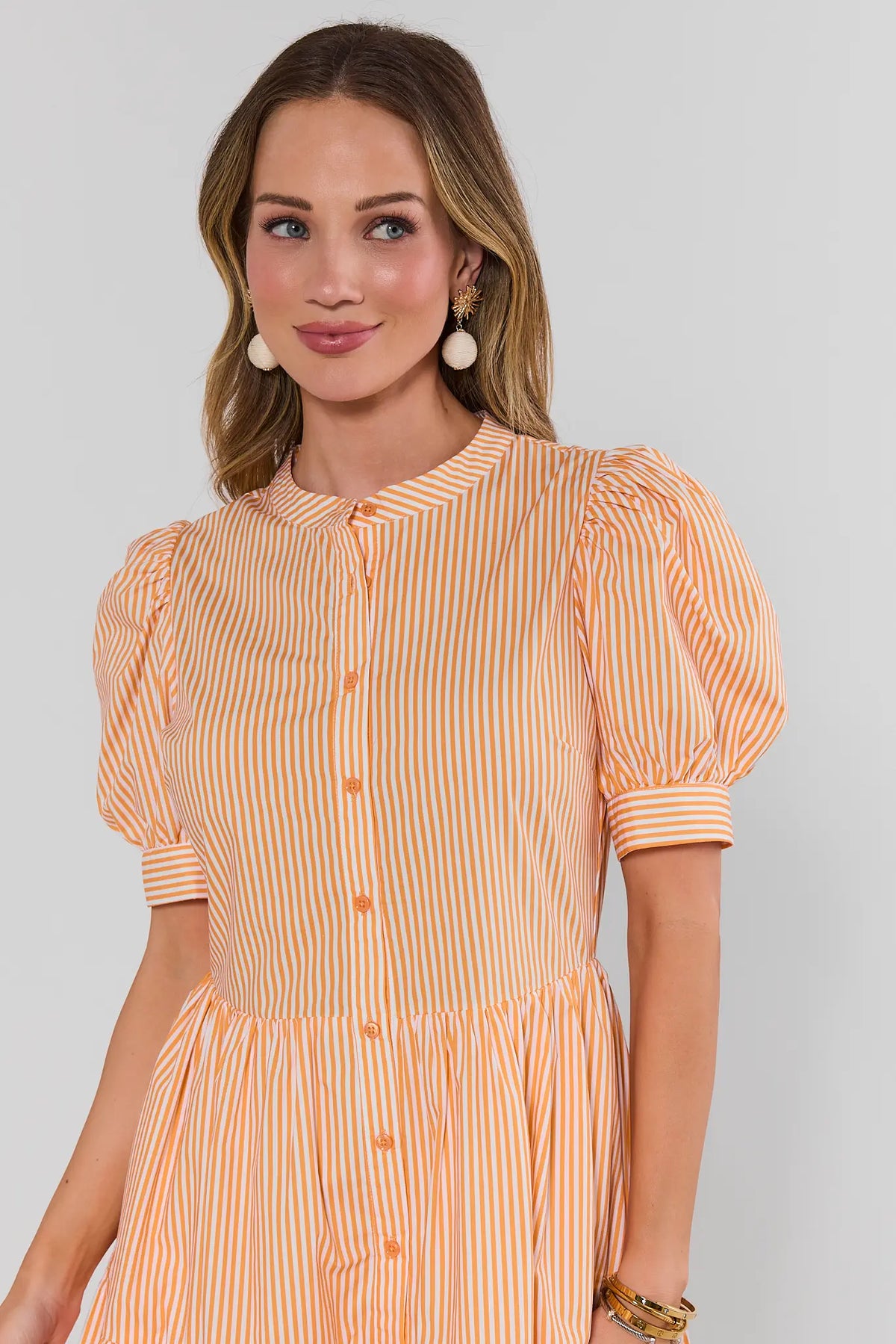 Martha Orange and White Striped Short Dress - Puff Sleeve & Button Front Close-Up Detail | Avara