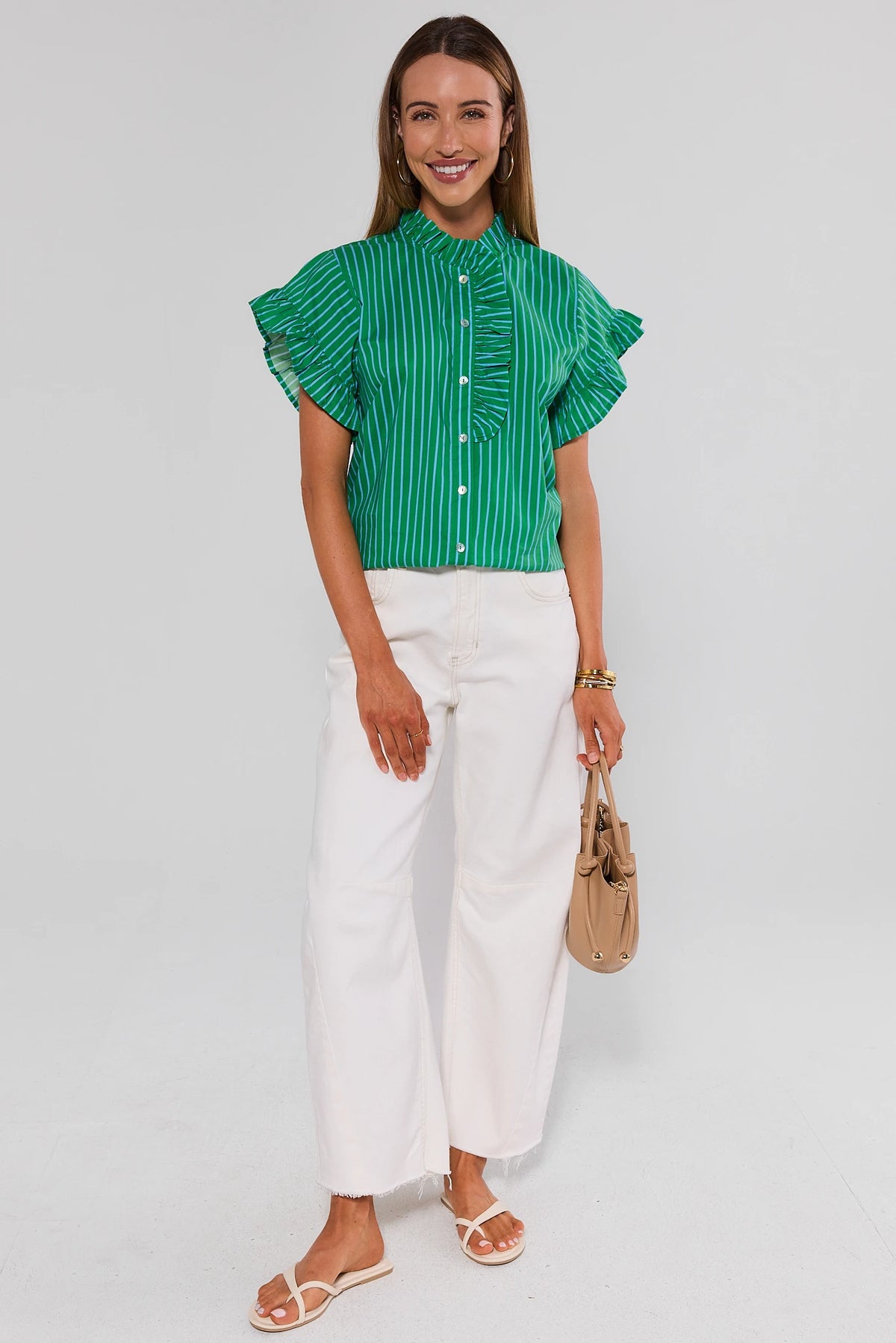 Green Striped Ruffle Top styled with white wide leg jeans and beige bag - Full Length | Avara
