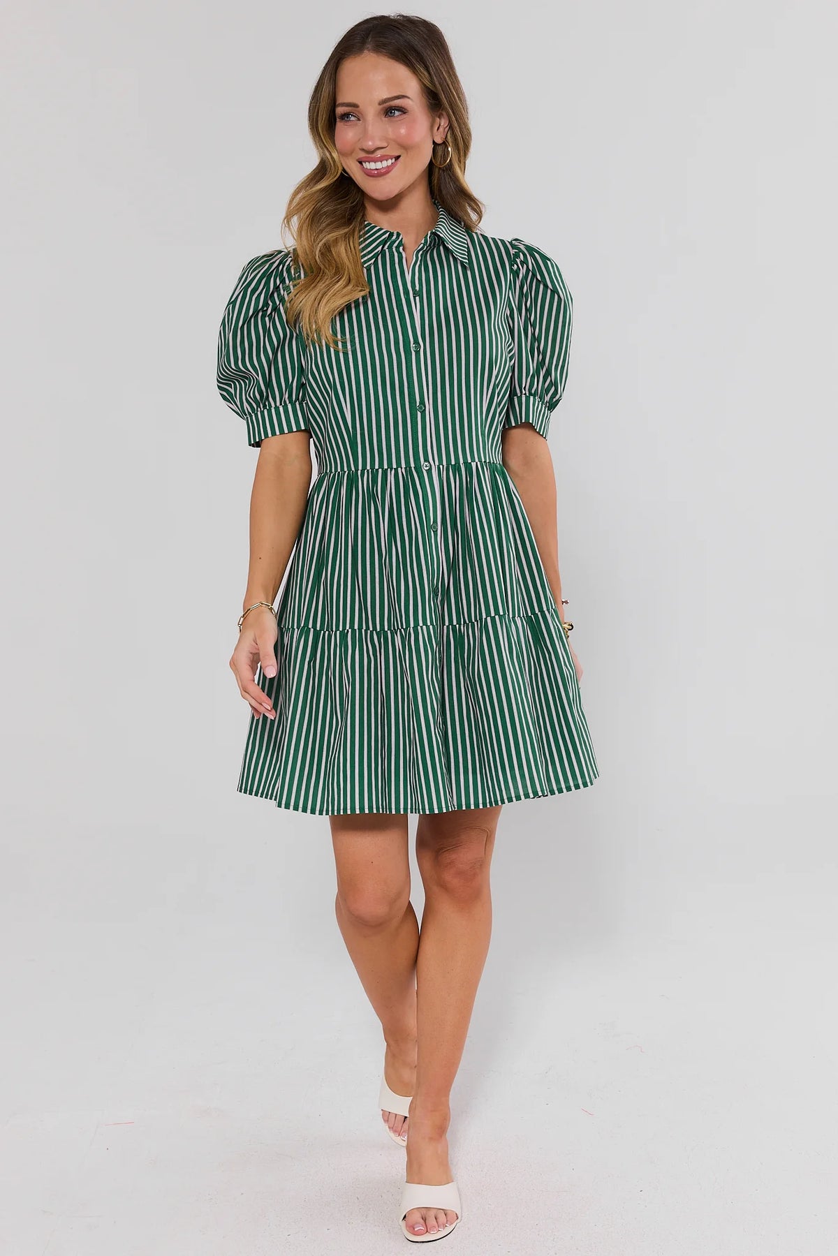 Green Contrast Stripe Short Dress with puff sleeves, tiered skirt, on model walking - Front View | Avara