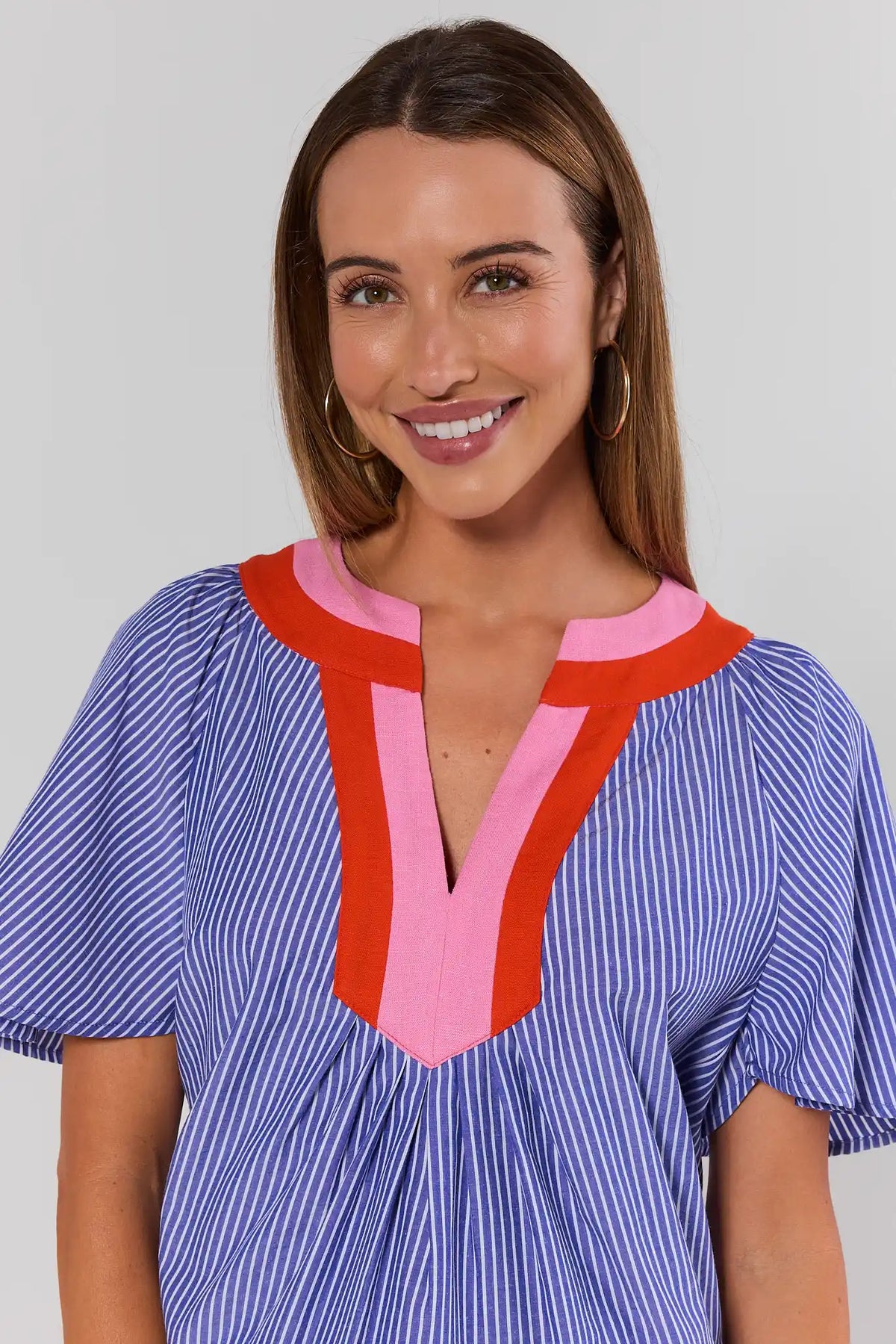Navy Striped Split Neck Top by THML - Split Neckline Close-Up, pink red contrast trim | Avara