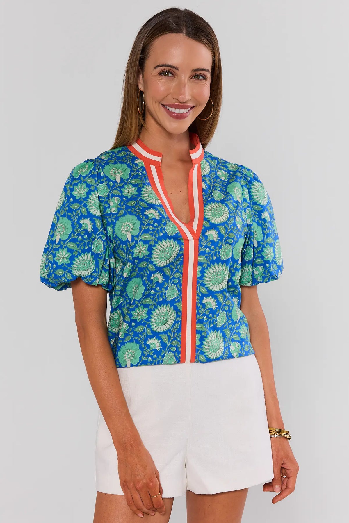 Blue floral printed contrast trim top with puff sleeves, front view on model - THML | Avara
