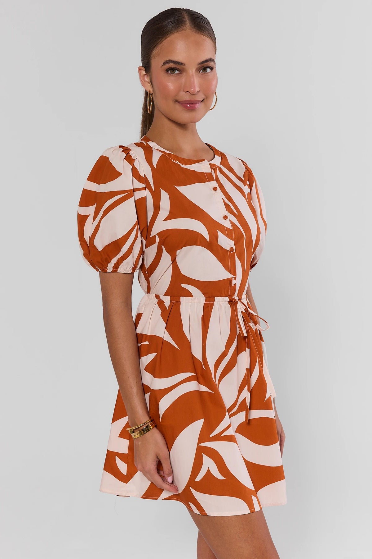 Antonia Orange Printed Short Dress with drawstring waist and puff sleeves - Side View | Avara