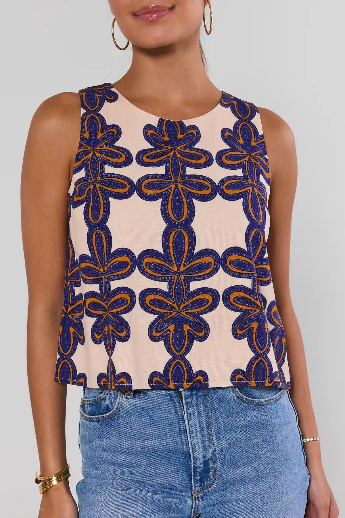 Cecilia Ivory Printed Tank Top close-up detail showing bold blue and orange abstract print, crew neckline | Avara