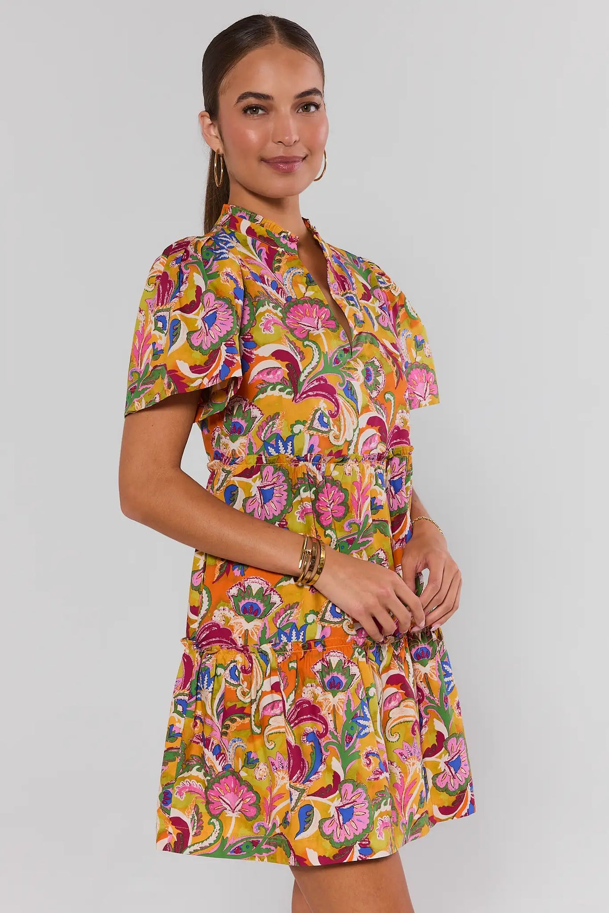 Evan Multi Paisley Printed Short Dress - Side Angle View Showing Flutter Sleeves & Ruffle Hem | Avara