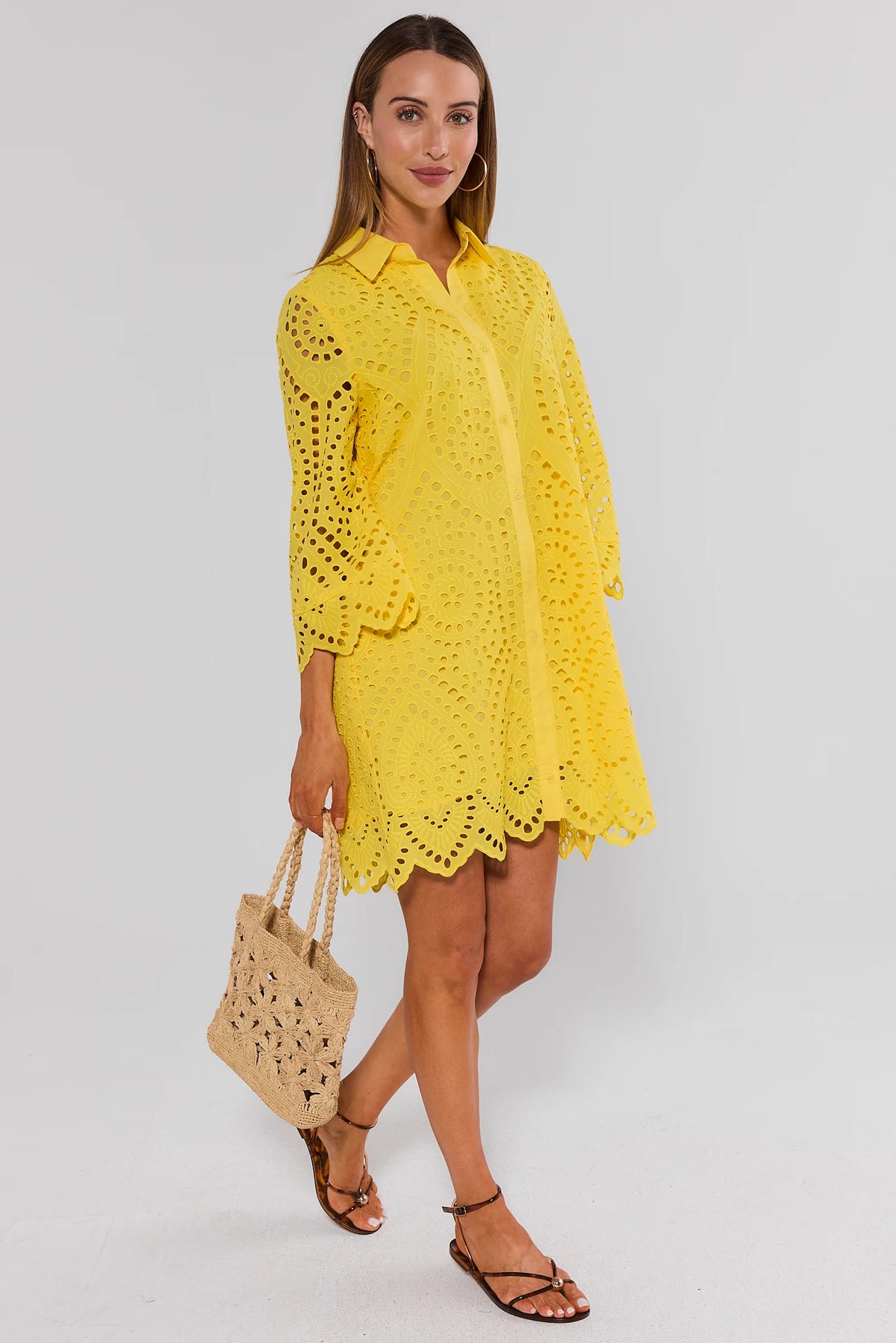 Yellow eyelet sundress with crochet tote and flat sandals - Side Walk View | Avara