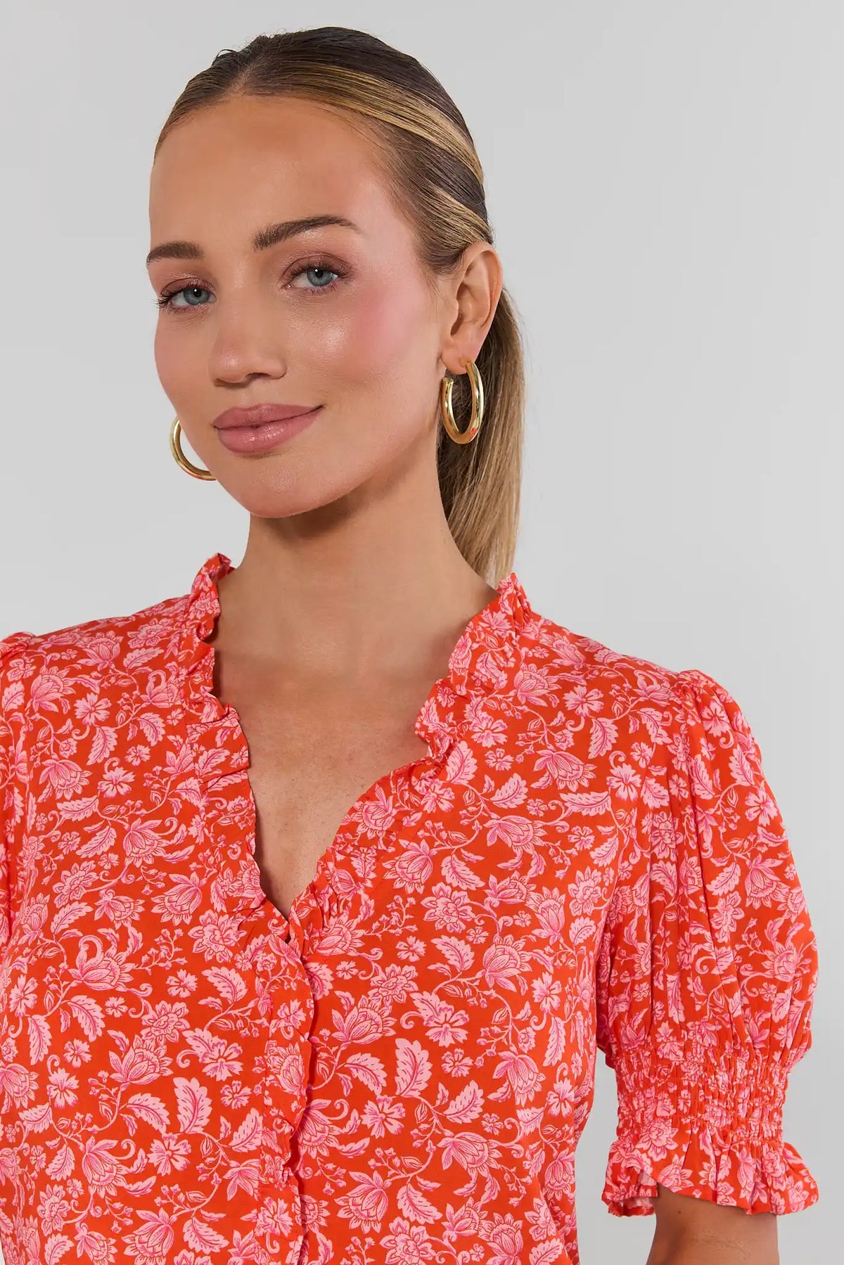 Orange Floral Puff Sleeve Top - Ruffle Collar & Smocked Cuff Close-Up Detail | Avara