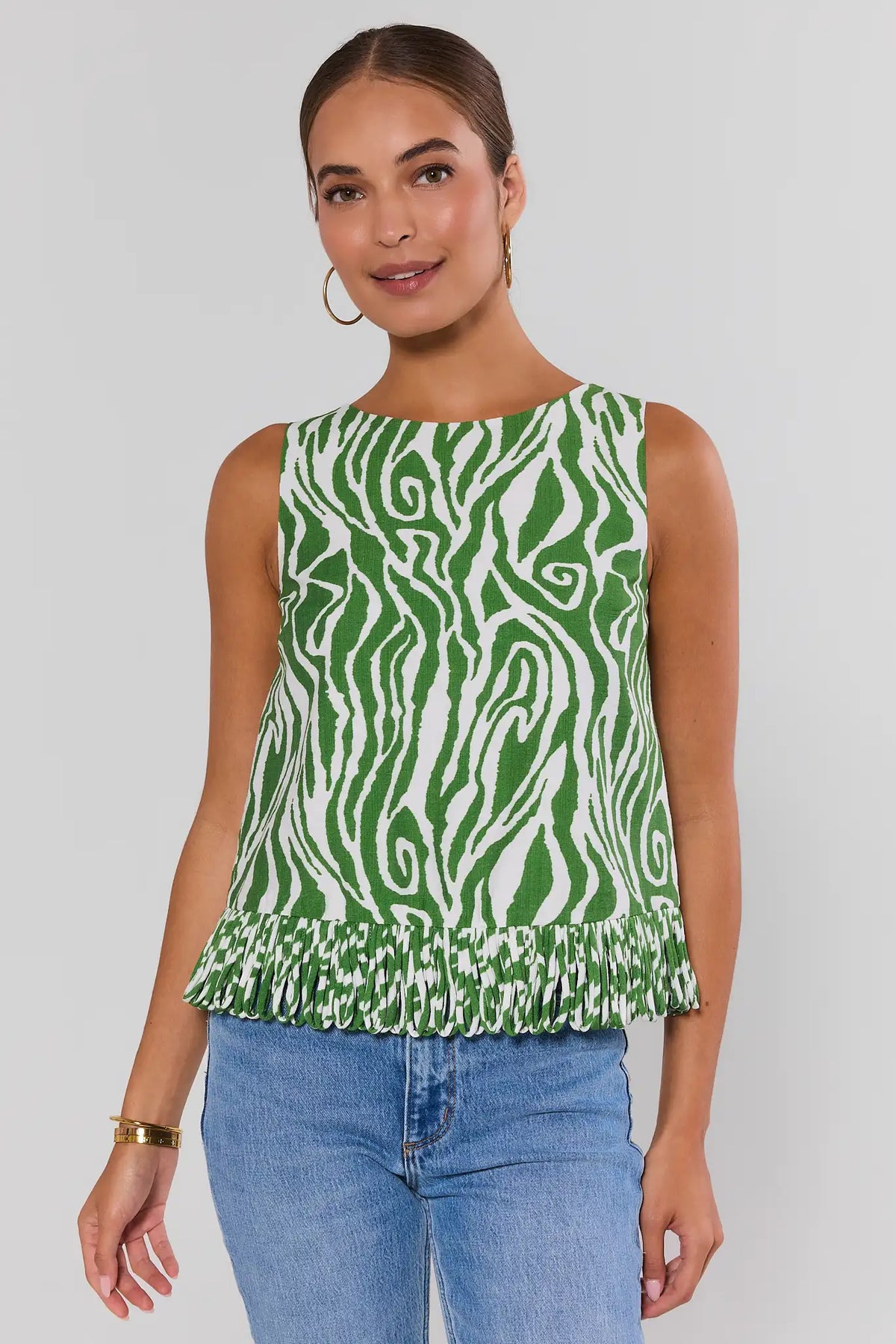 Angelina Green Zebra Fringe Top with blue jeans on plain background - Front View | Avara