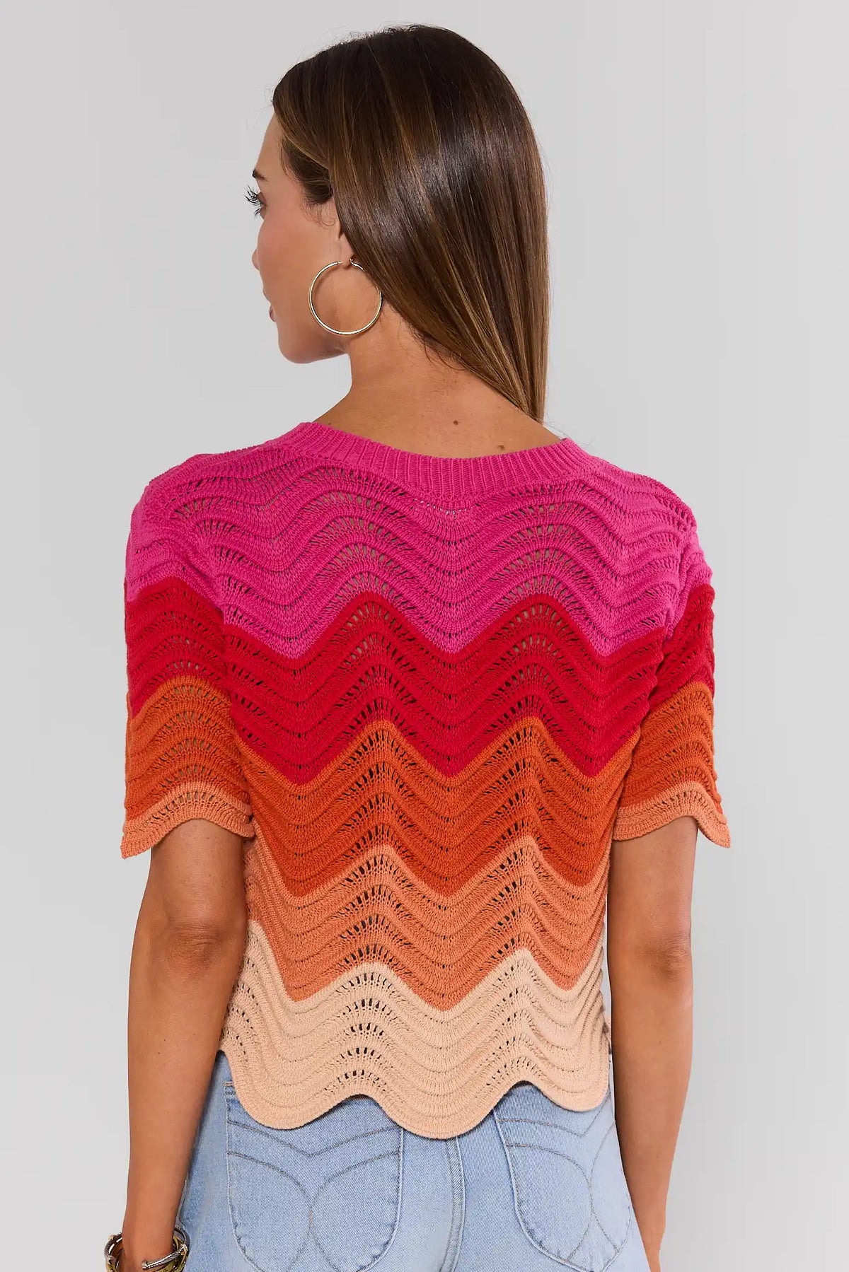 Pink Color Block Knit Top showing chevron wave colorblock and scalloped hem - Back View | Avara