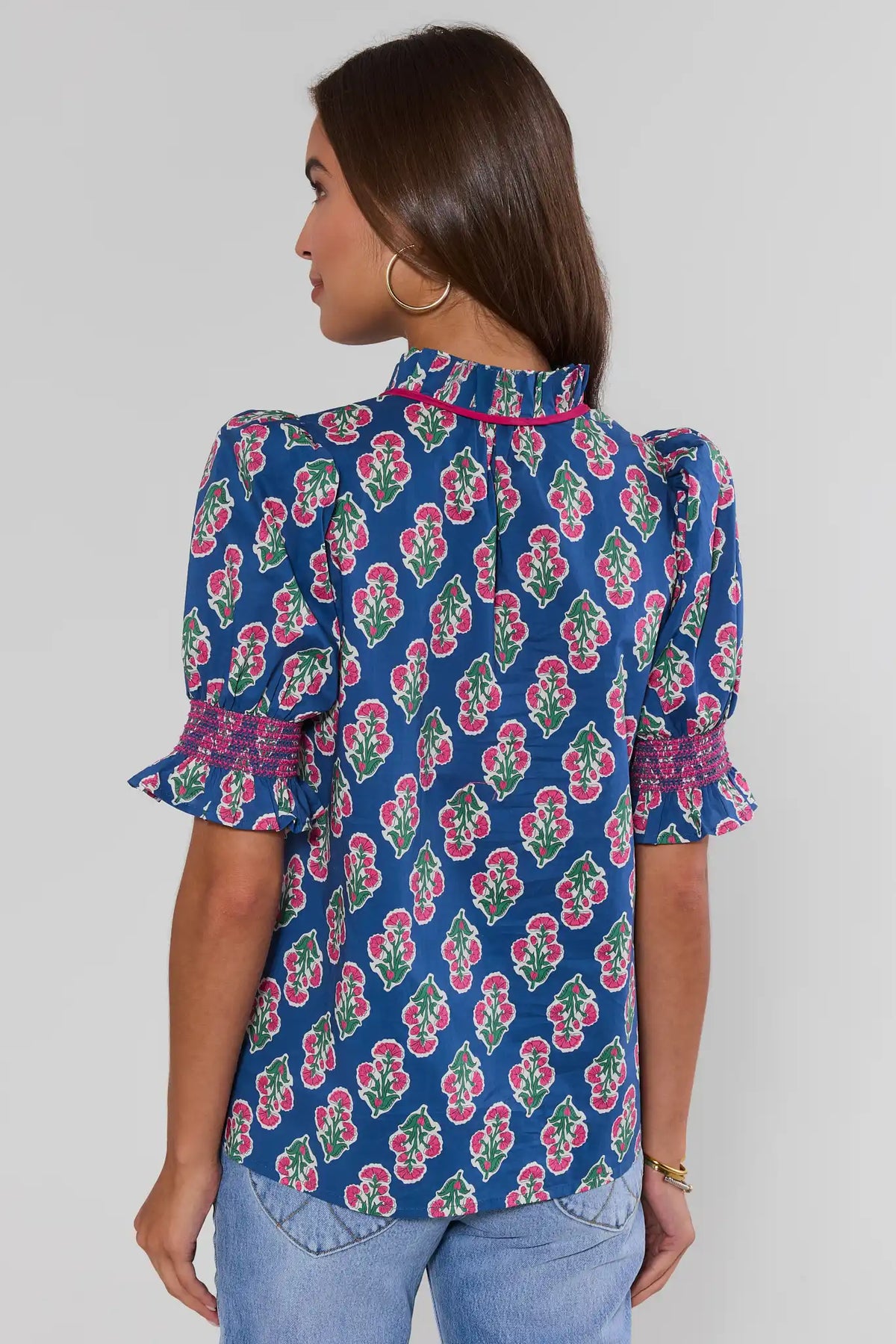Navy printed smocked detail top showing puff sleeves and smocked ruffle cuffs - Back View | Avara