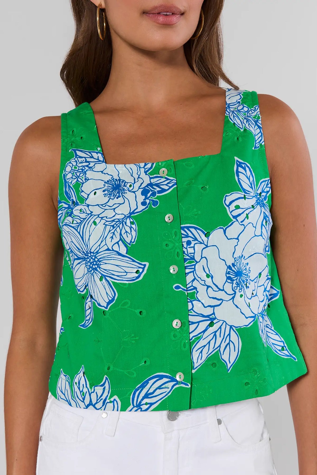 Green printed eyelet tank top with blue floral print and pearl buttons - Close-Up Detail | Avara