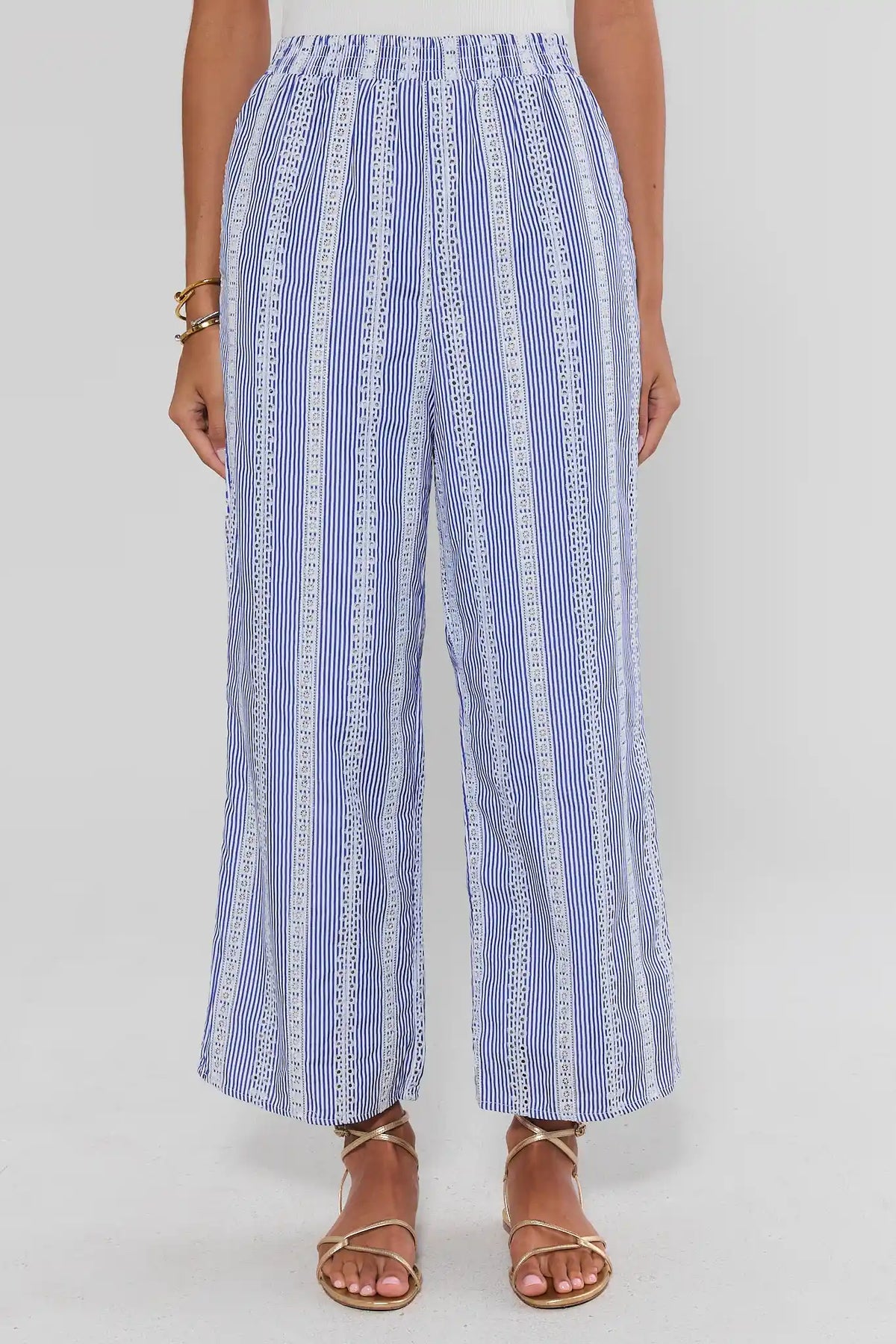 Blue stripe embroidered wide-leg pants with elastic waist, on model close-up front view | Avara
