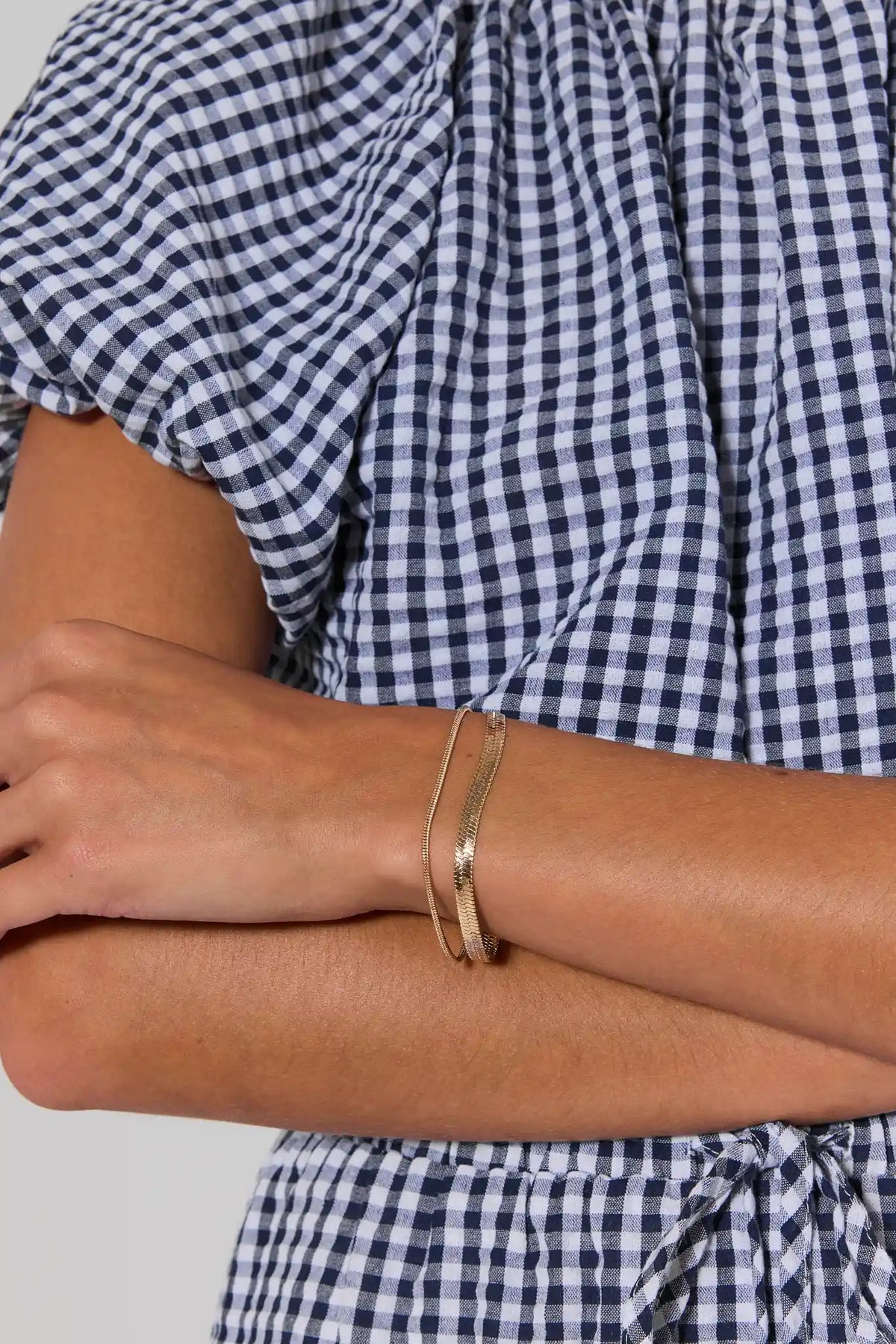Gold Herringbone Bracelet Set stacked on wrist, On Model Close-Up | Avara