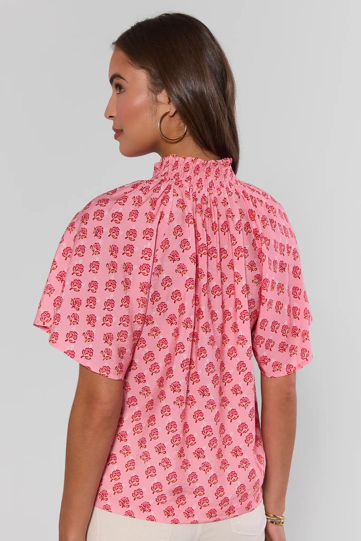 Pink printed THML flutter sleeve top with smocked high neck - Back View | Avara