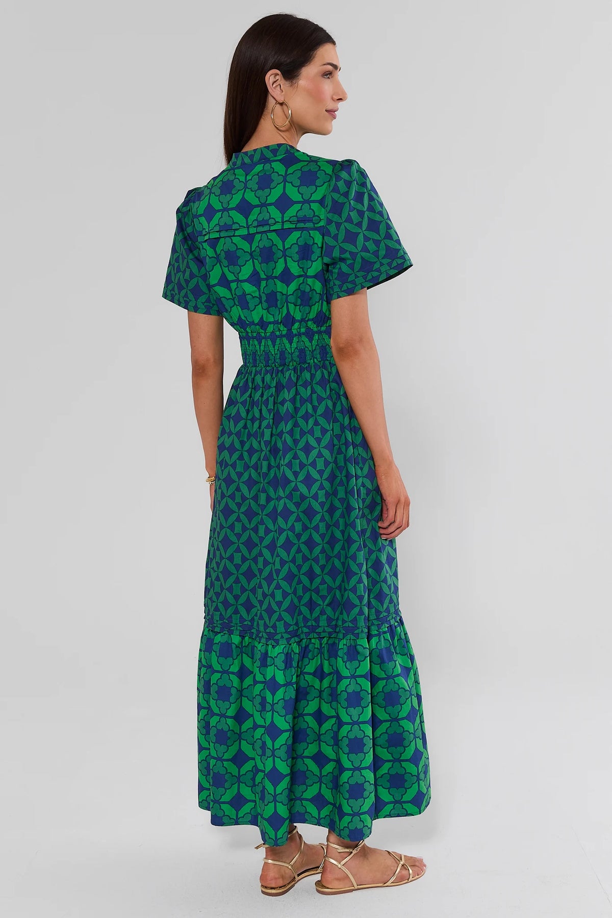 Isabella Green Navy Geometric Print Maxi Dress - Back View showing smocked waist, tiered skirt, and short sleeves | Avara