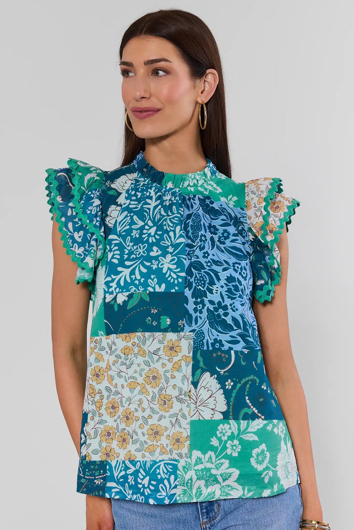 Green Multi Patchwork Print Top with flutter sleeves and ric-rac trim, front view on model | Avara