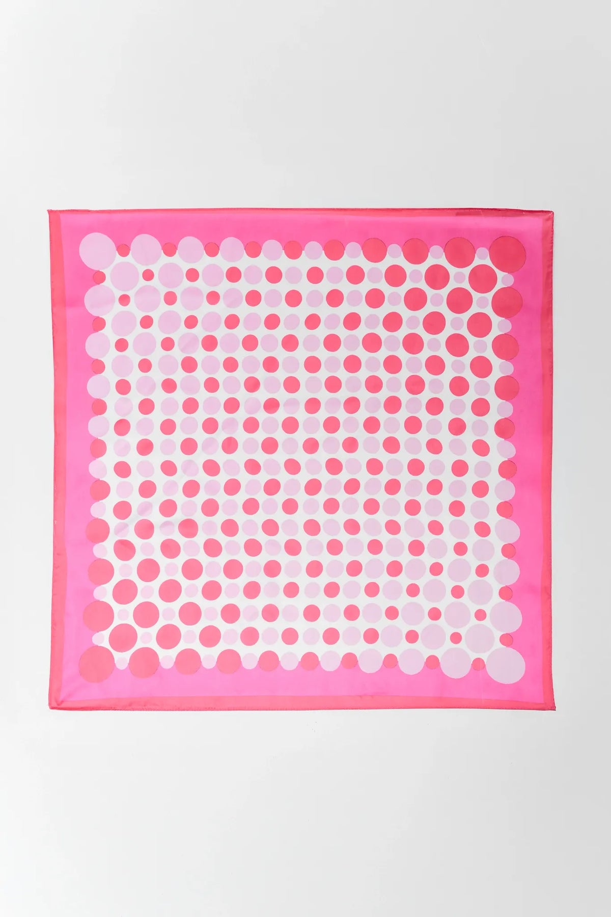Pink Multi Polka Dot Scarf flat lay, multi-toned pink dots on white - Top View | Avara