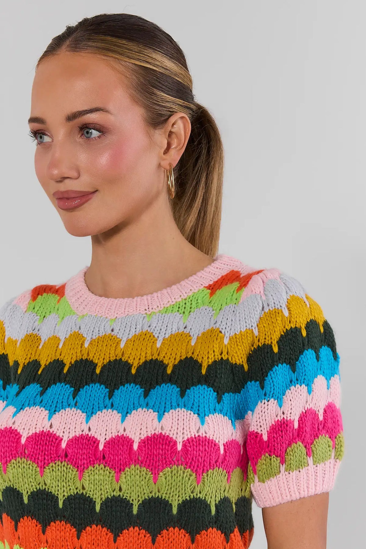 Close-up of Trina Multi Striped Knit Top - Neckline and Fabric Detail, bold rainbow scallop stripe knit | Avara