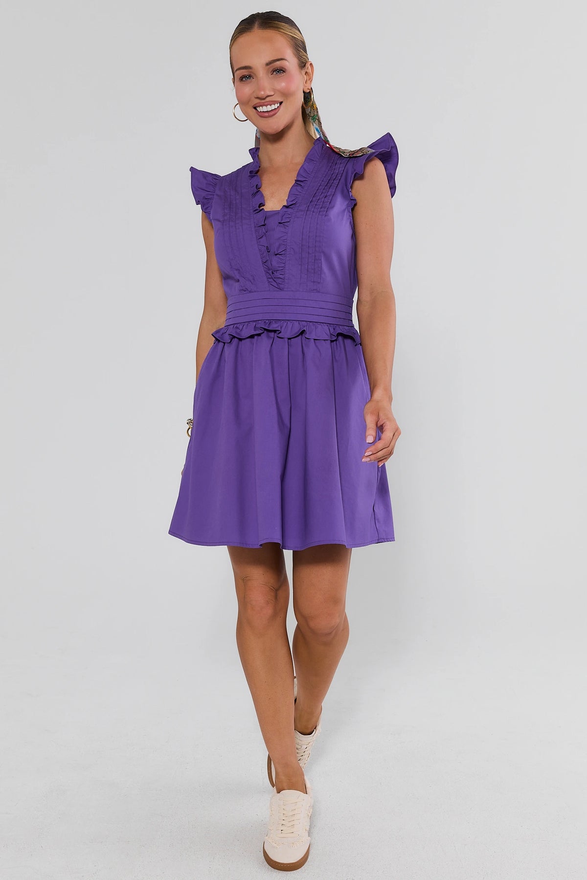 Makayla Purple Flutter Sleeve Short Dress walking view, full-length A-line silhouette with ruffle flutter sleeves | Avara