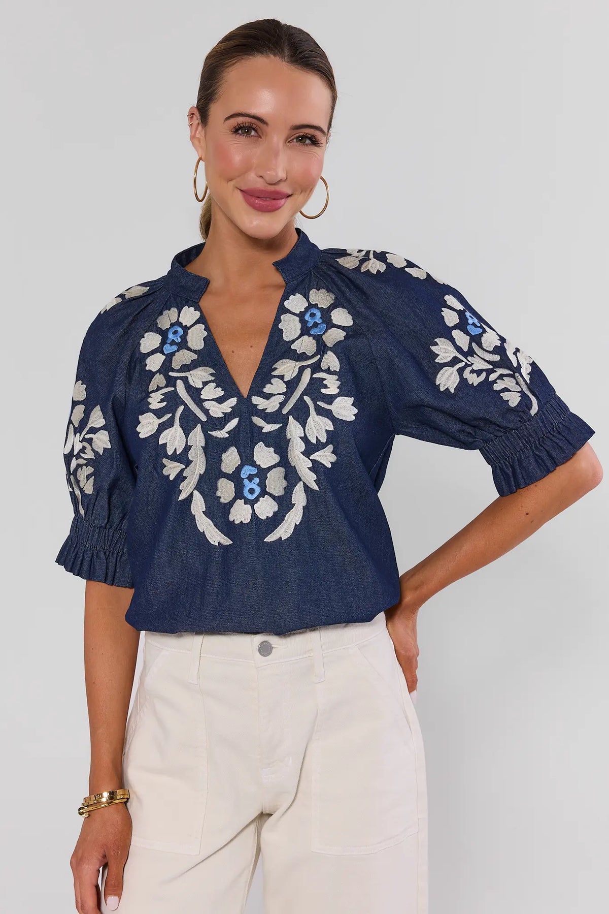 Woman wearing Navy Floral Embroidered Top by THML - Front View, Chambray with Cream Embroidery | Avara
