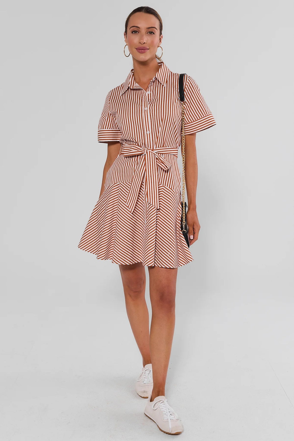 Millie Rust Striped Short Dress side profile view showing tie waist and flared skirt silhouette | Avara