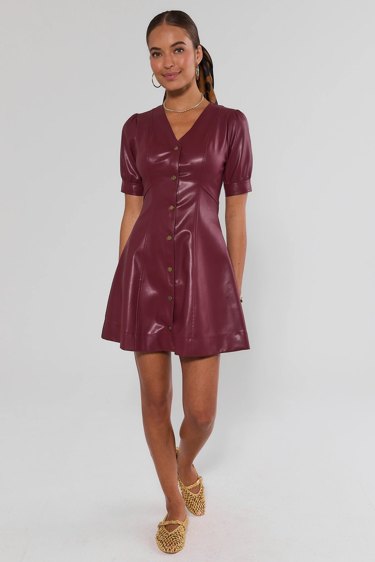 Burgundy faux leather short dress with woven sandals - Full Front View | Avara