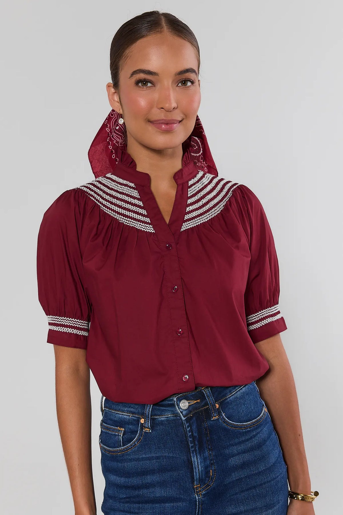 Yvonne Burgundy and White Embroidered Top with jeans and sneakers - Full Front View | Avara