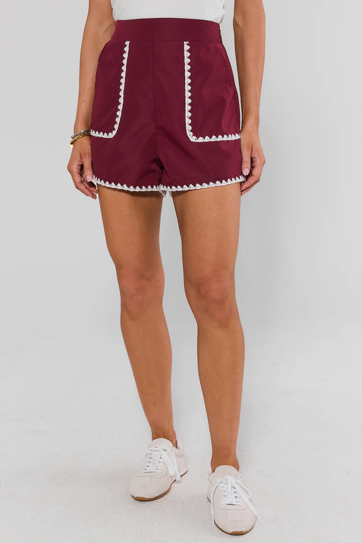 Maroon Embroidered Trim Shorts styled with white tank and denim jacket - Full Length Front View | Avara