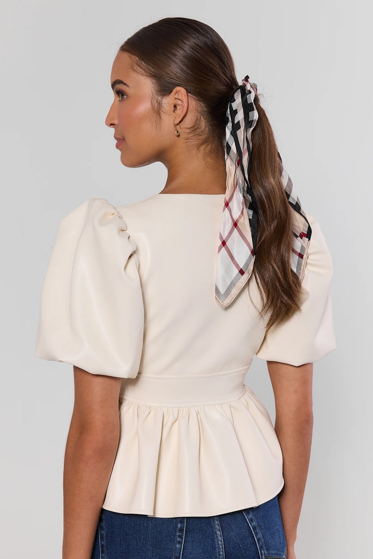Ivory faux leather peplum top with gathered peplum hem and puff sleeves - Back View | Avara