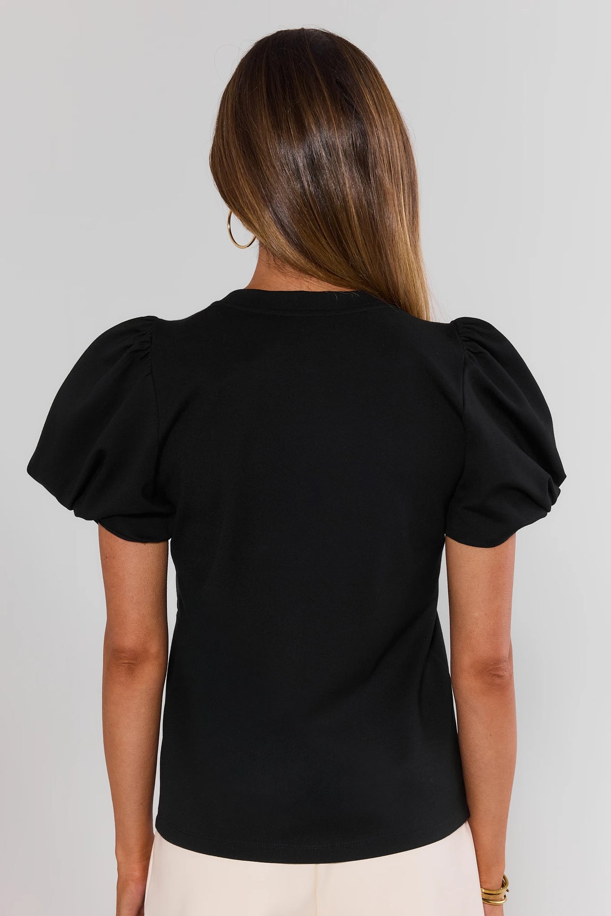 Black puff-sleeve crewneck tee showing gathered sleeve and back silhouette - Back View | Avara
