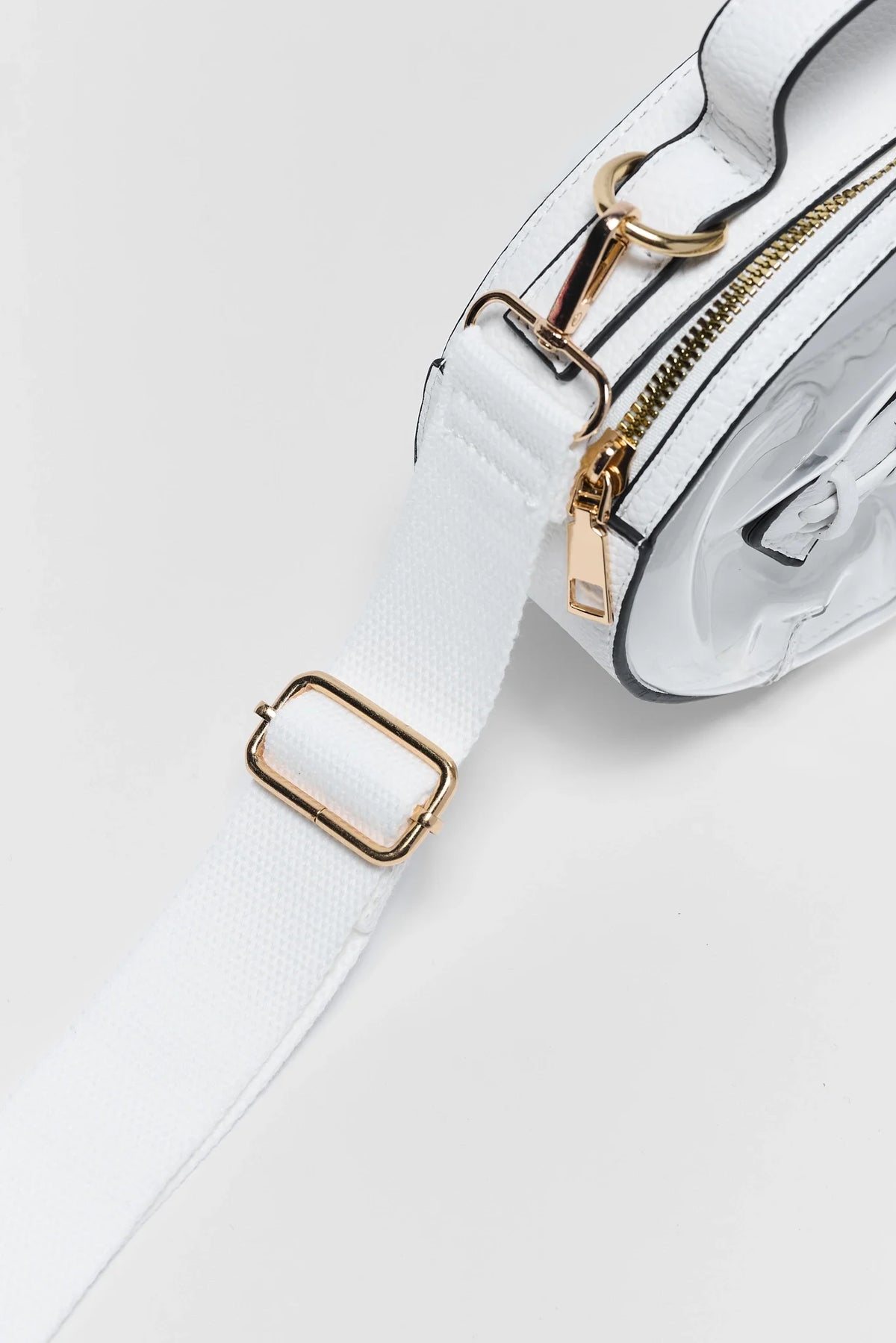 White Football Clear Crossbody Bag wide canvas strap with gold adjustable buckle - Hardware Detail | Avara