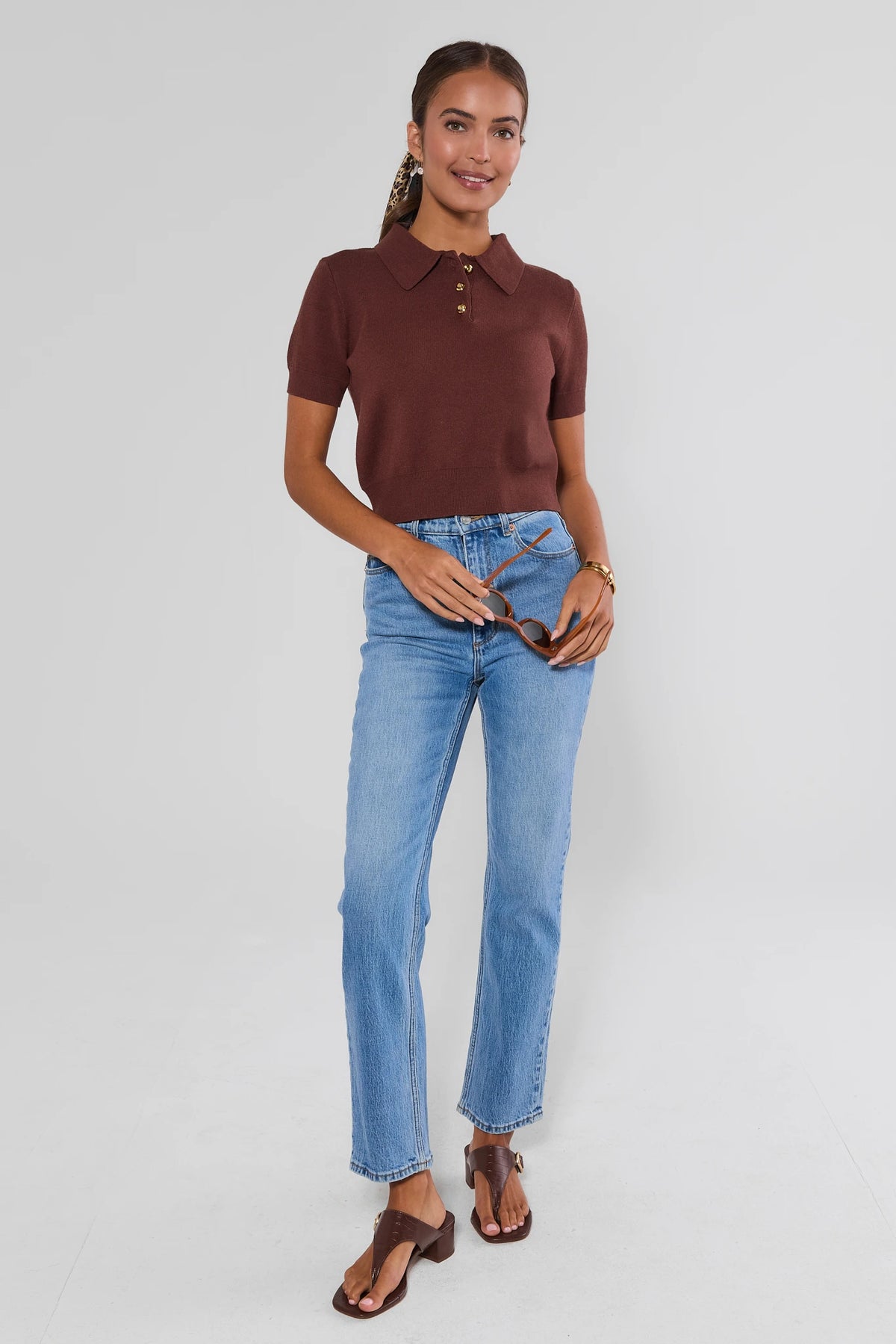 Ada Brown Knit Short Sleeve Top styled with light-wash jeans and brown sandals - Full Length View | Avara