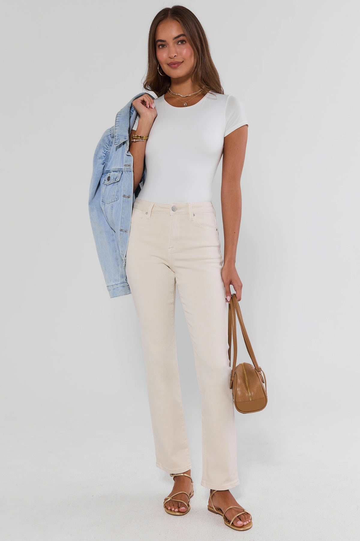 Becca Ecru Straight Leg Jeans styled with white tee, denim jacket, and tan crossbody bag - Full Styled Look | Avara