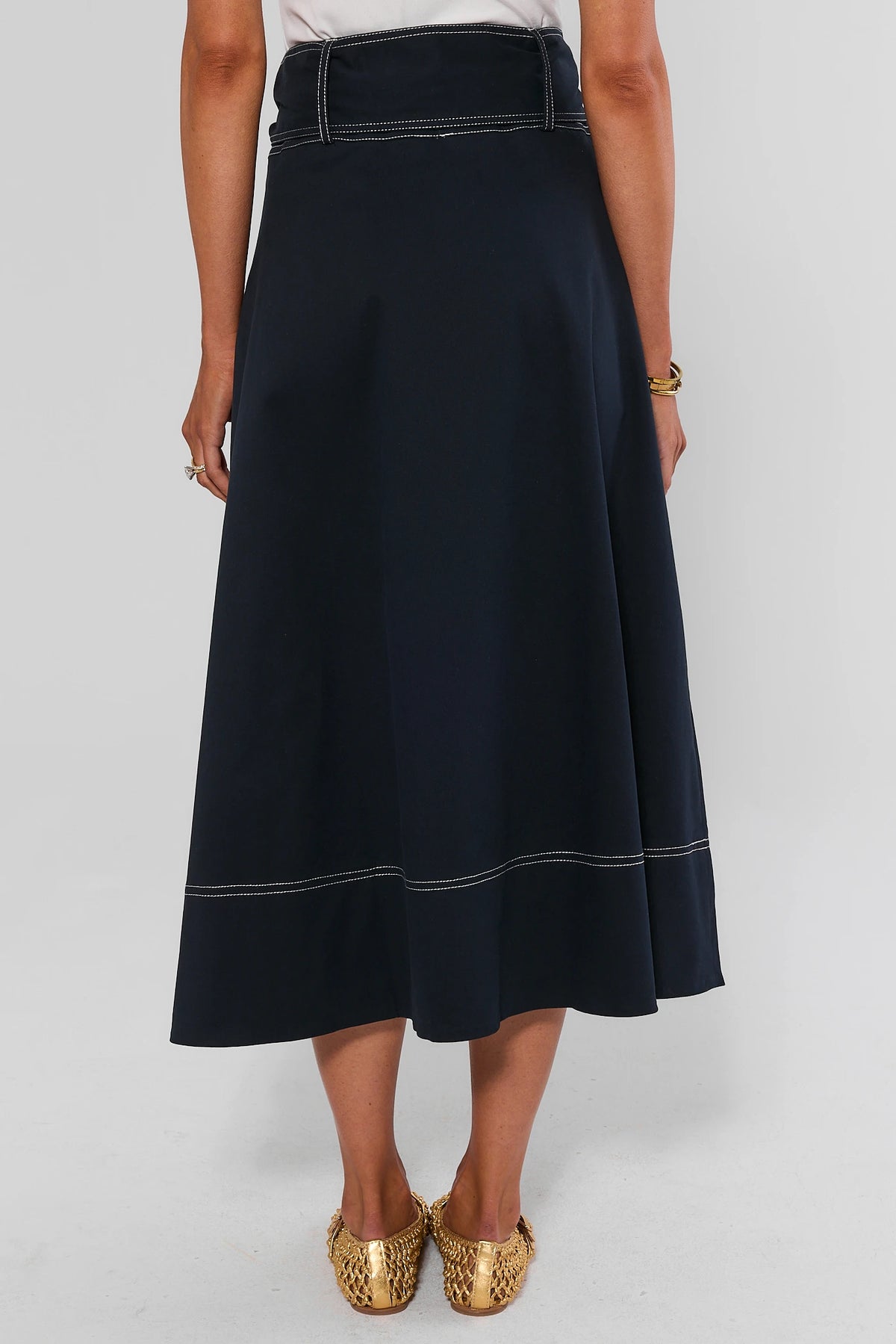 Navy Charlotte Tie Waist Midi Skirt with contrast hem stitching - Back View showing full A-line sweep | Avara