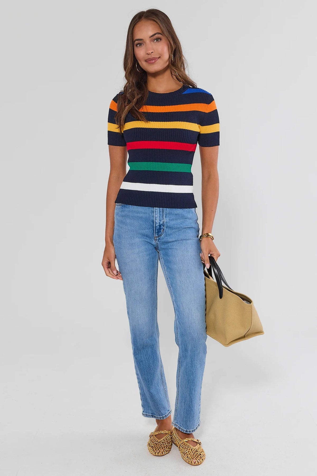Multi-striped ribbed knit top styled with light-wash jeans and tan tote - Full-Length Styled Look, cute tops for women | Avara